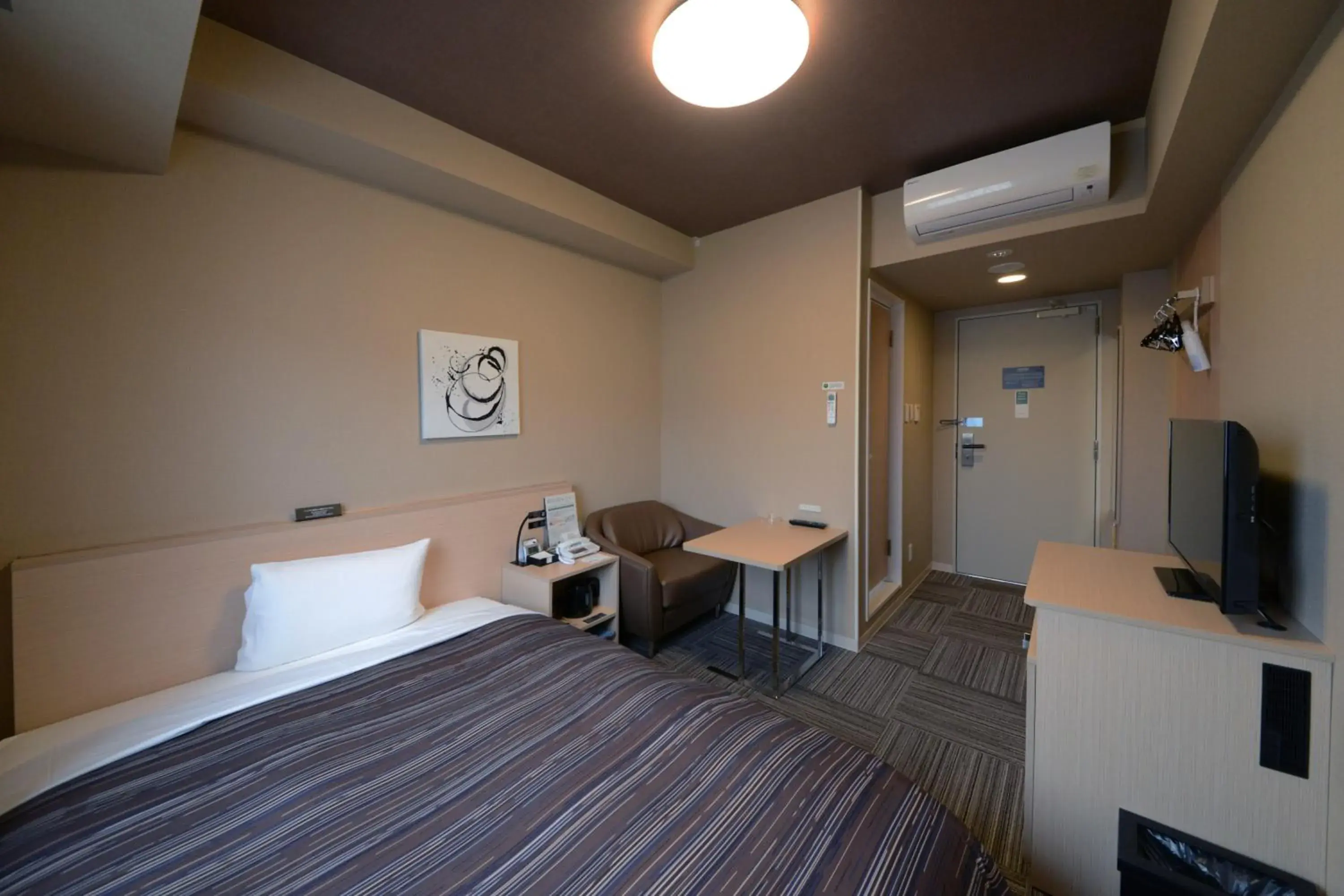 Bed in Hotel Route Inn Grand Ueda Ekimae