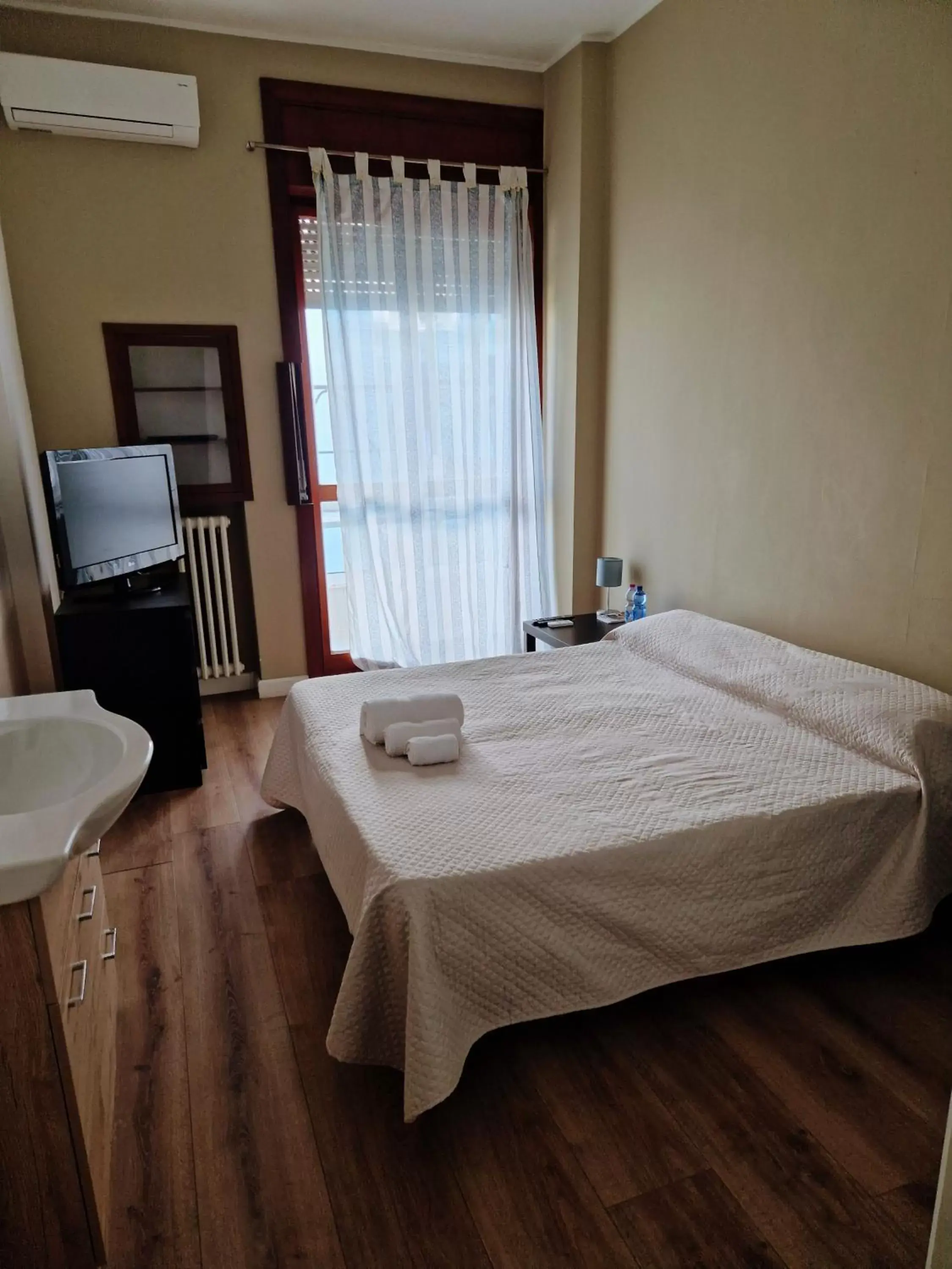 Bed in Battisti Rooms & Breakfast