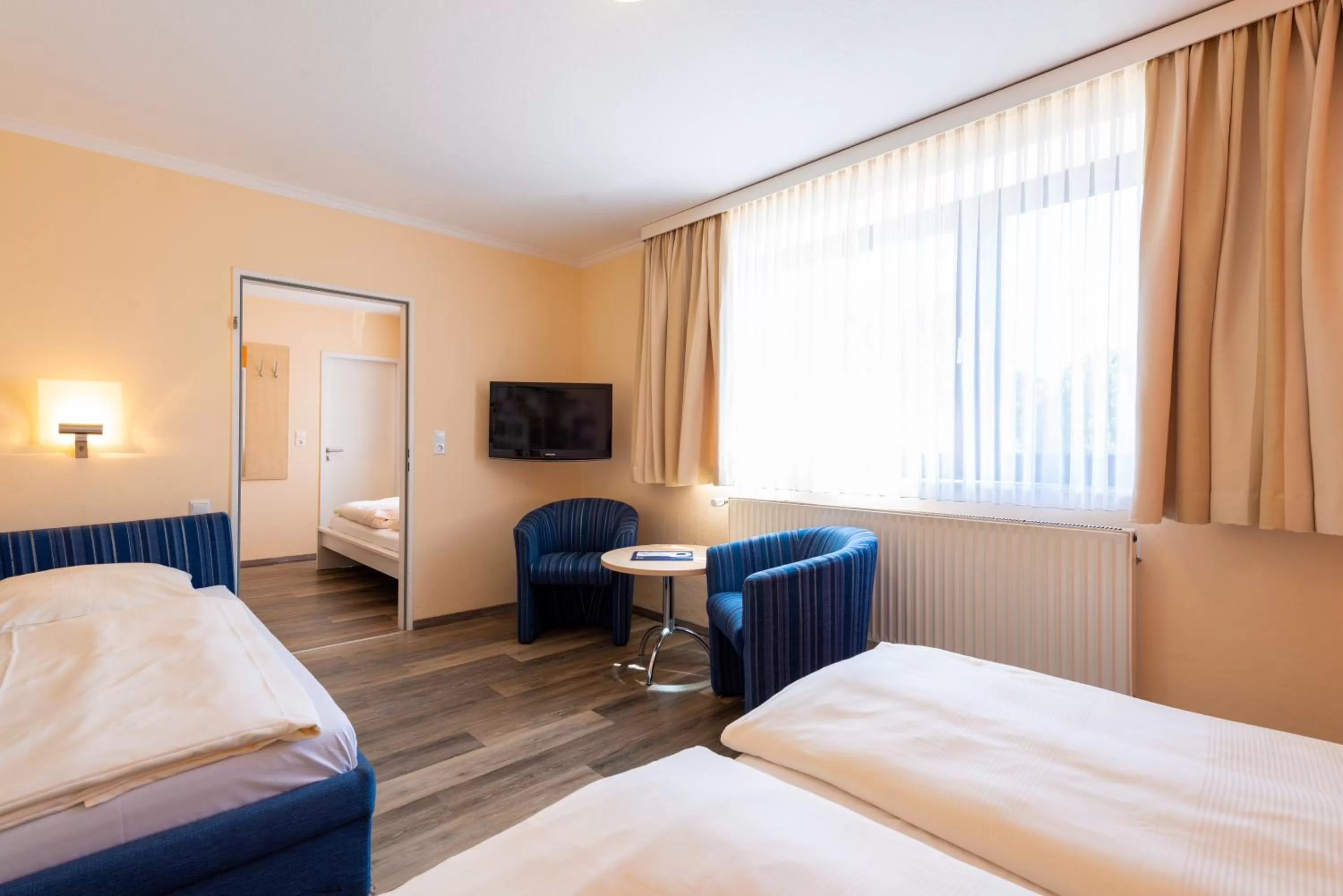 Bed in Hotel Heldt Dependance