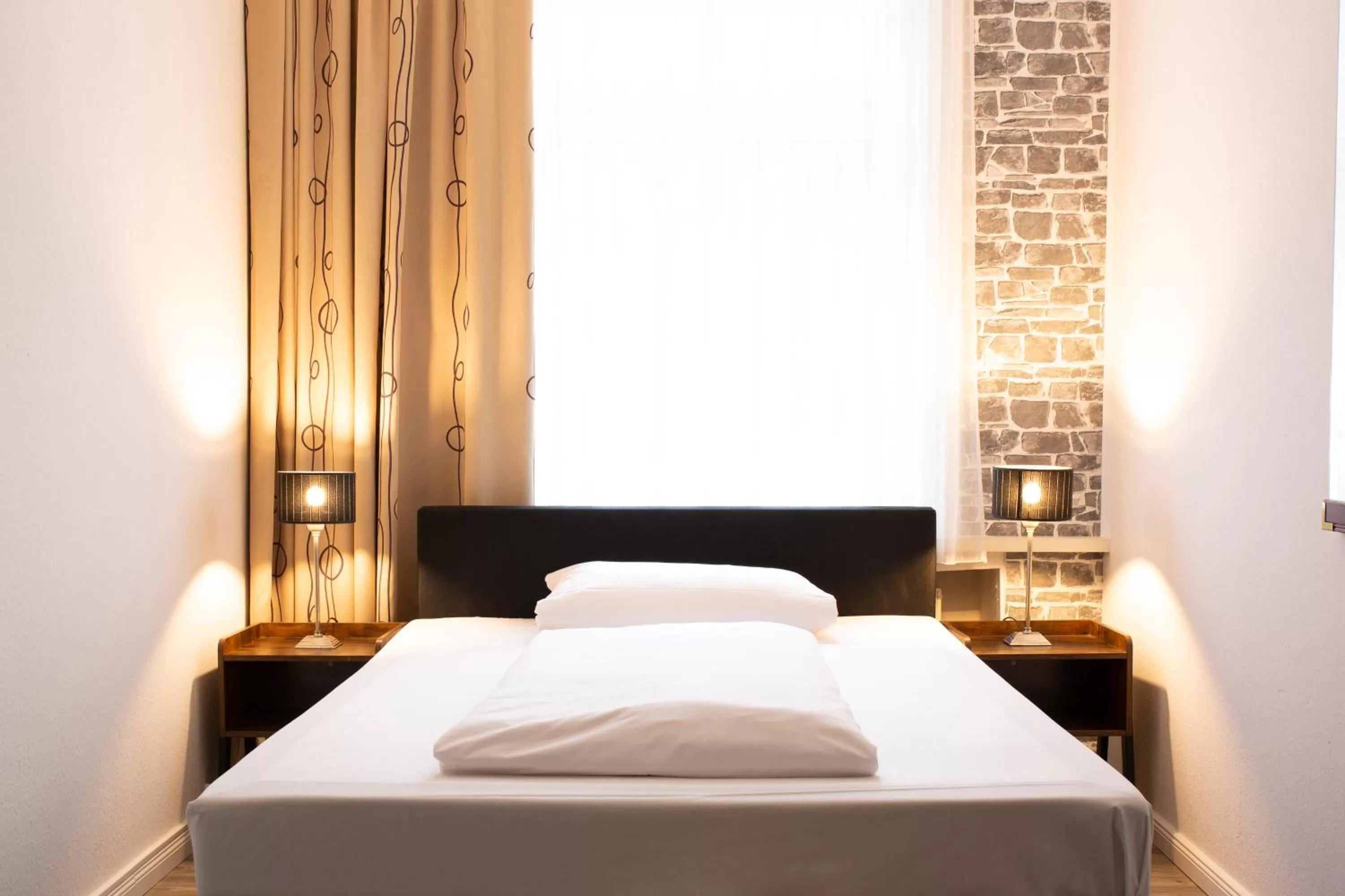 Bed in Hotel Berliner Hof