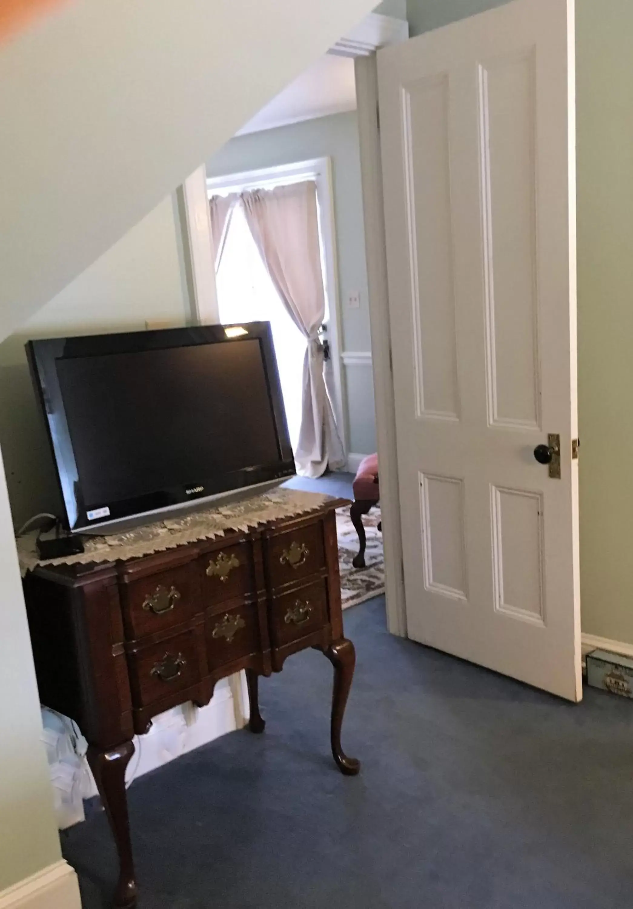 Decorative detail, TV/Entertainment Center in Parsonage Inn Bed and Breakfast