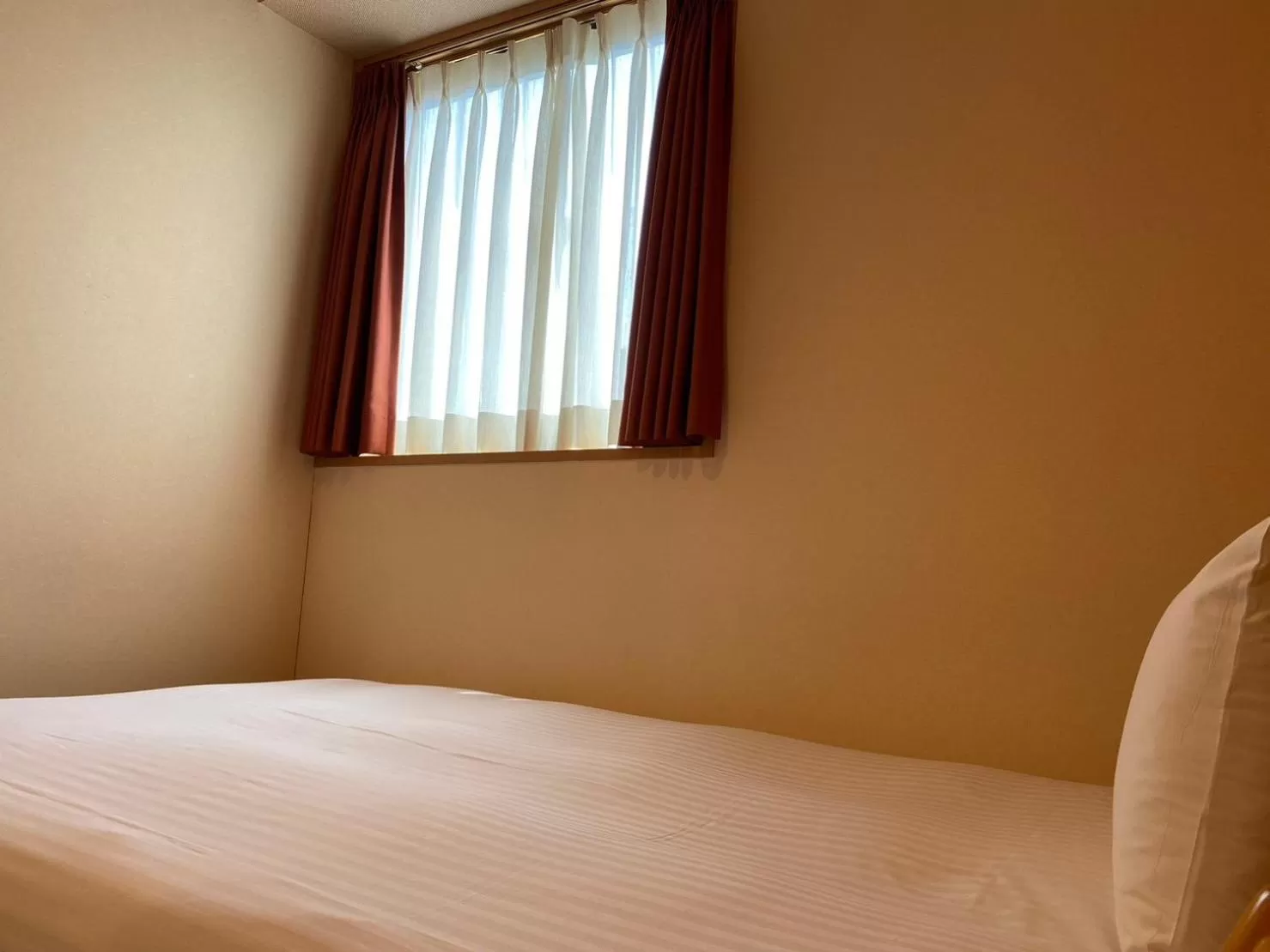 Bed in SAKURA SKY HOTEL KASHIWA(桜スカイホテル柏)