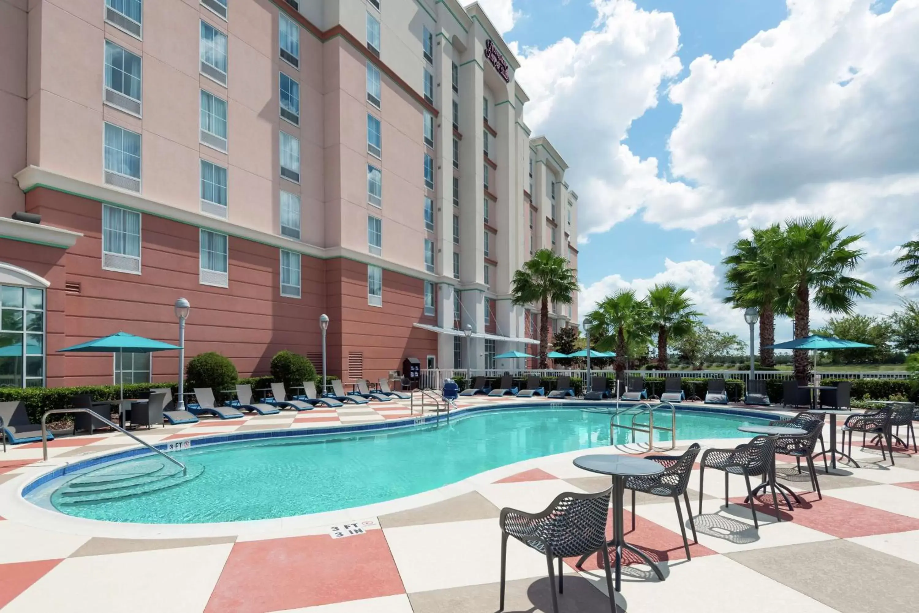 Pool view, Swimming Pool in Hampton Inn & Suites Orlando Airport at Gateway Village