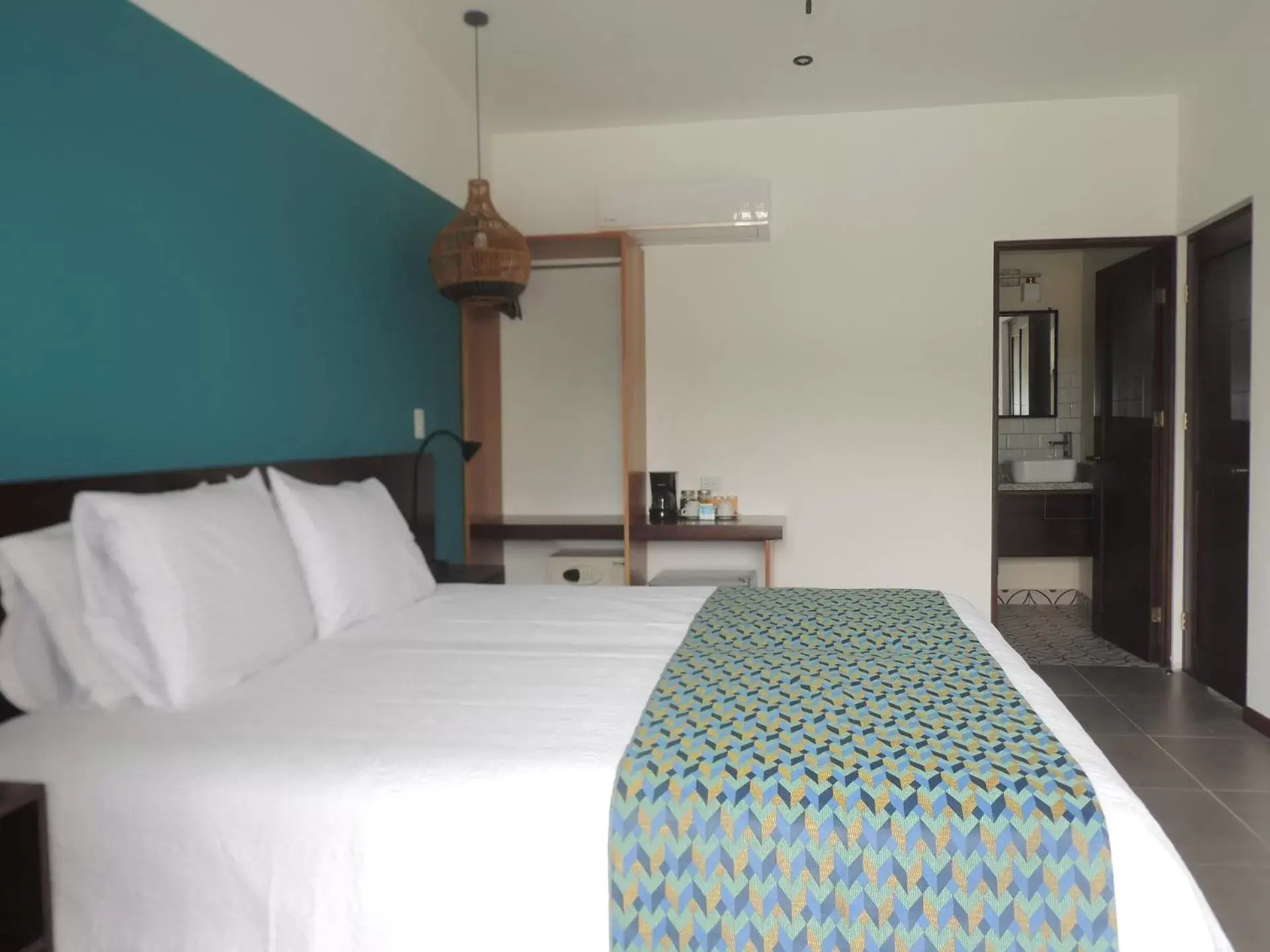 Bed in La Fortuna Lodge by Treebu Hotels