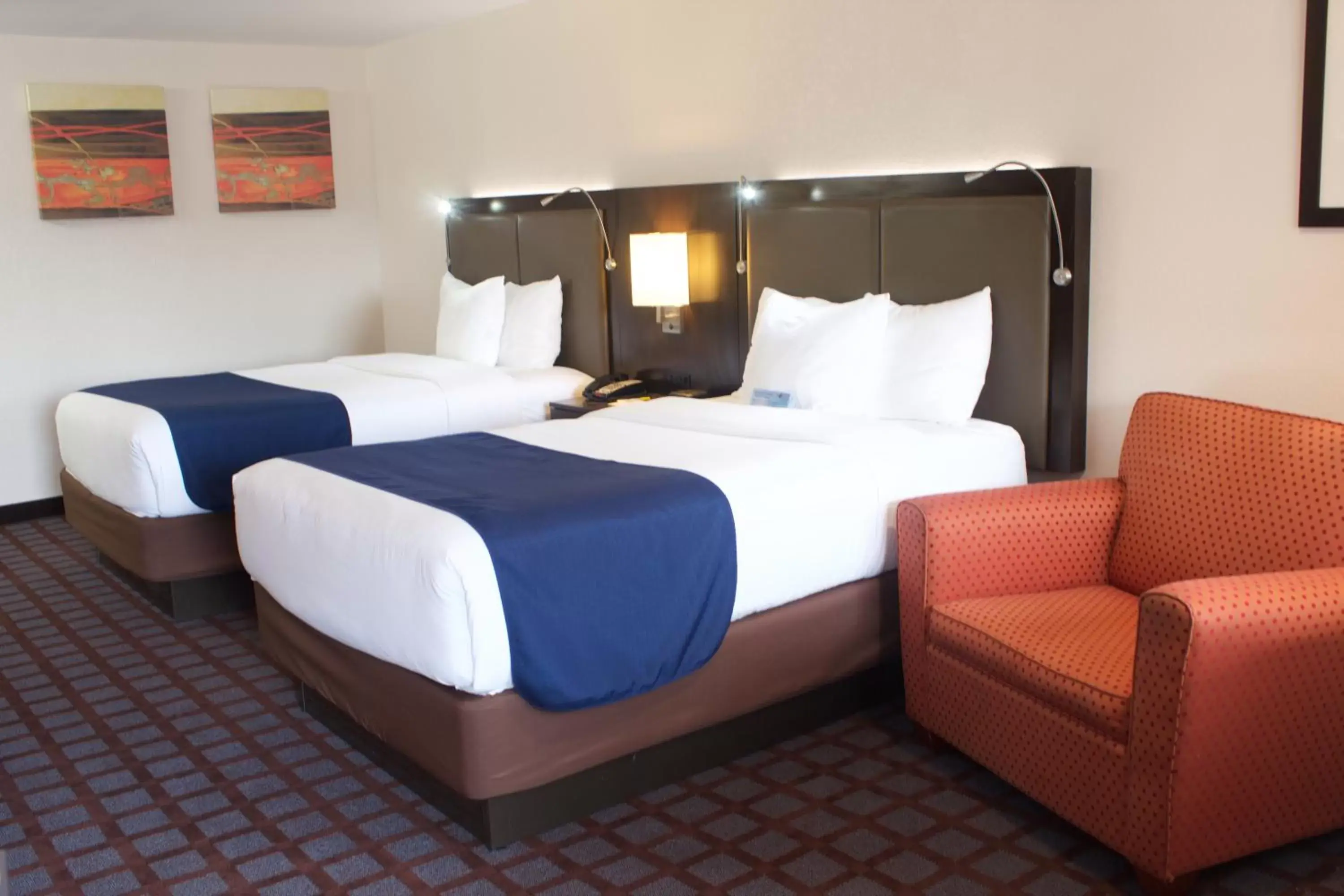 Photo of the whole room, Bed in Days Inn by Wyndham Woodbury Long Island