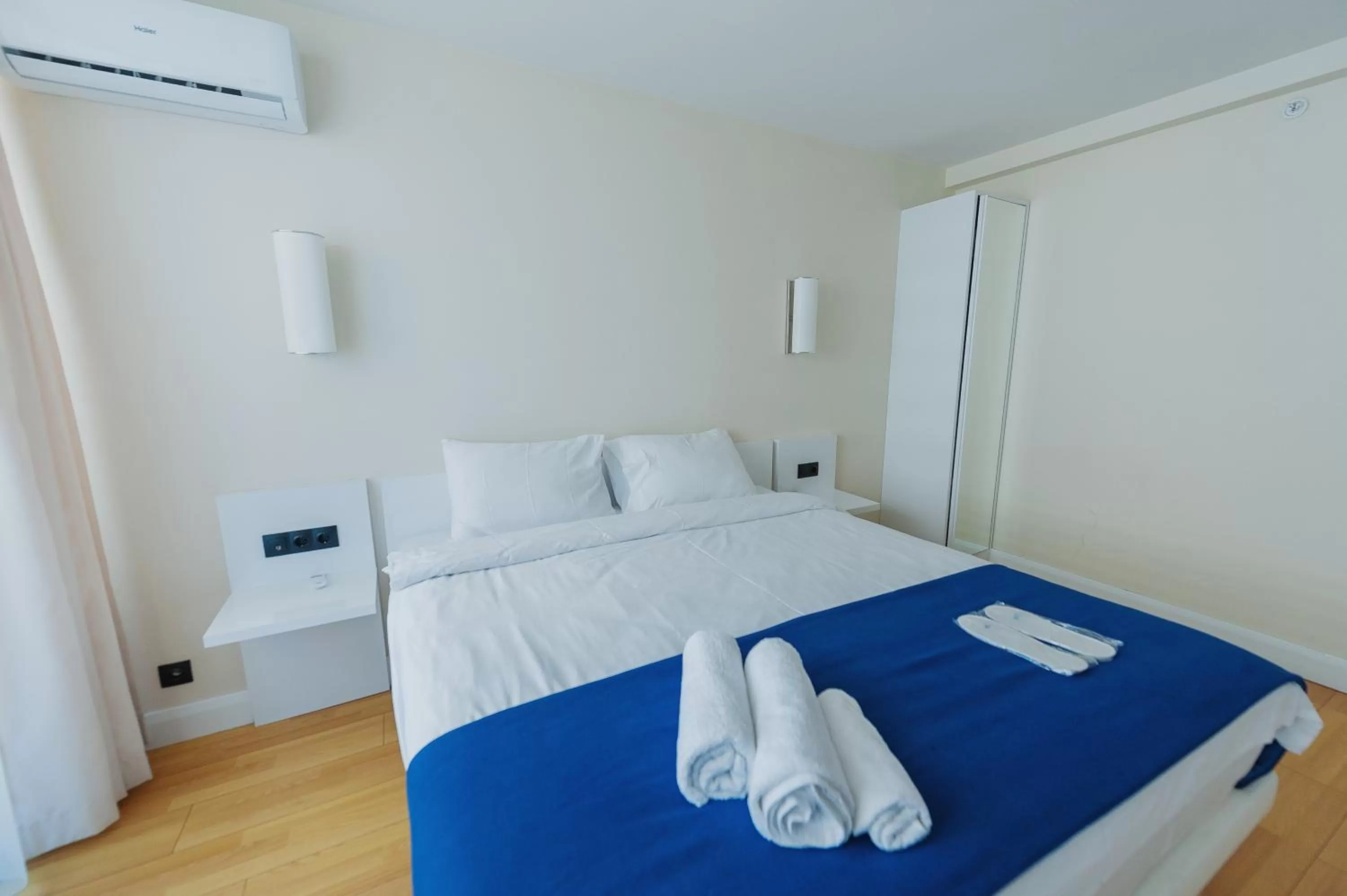 Bed in Orbi City Luxury Suite