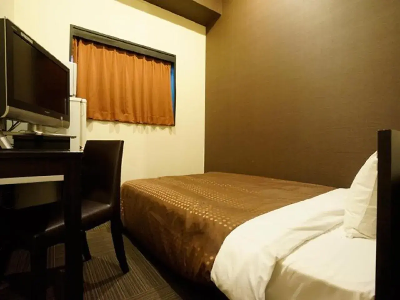 Bed in HOTEL LiVEMAX BUDGET Esaka