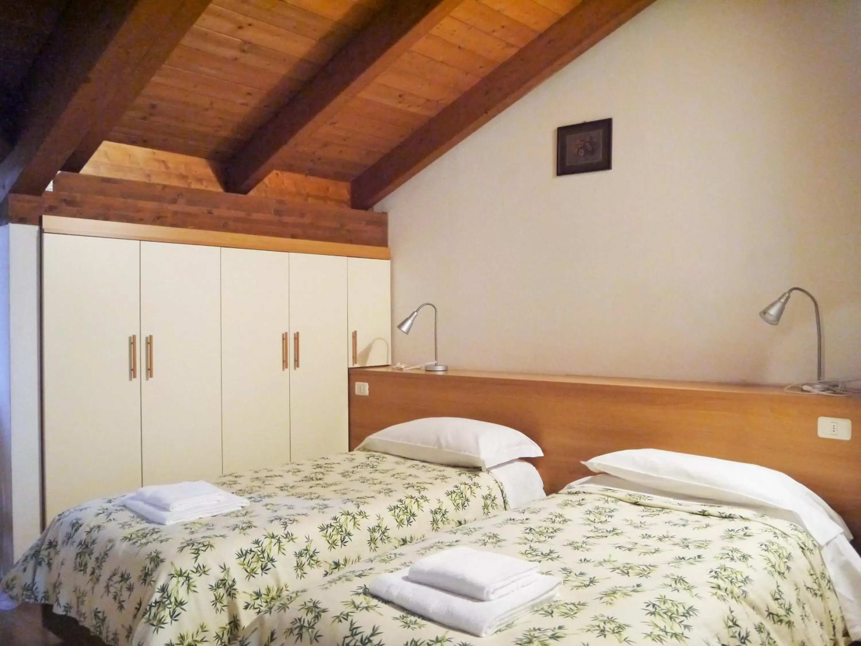 Bed in Hotel Oasi