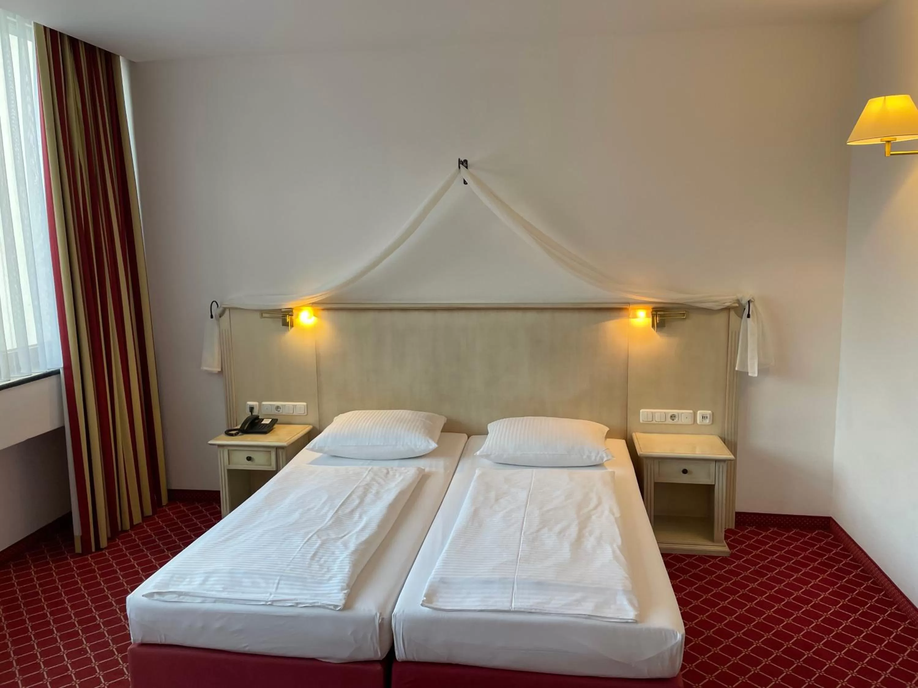 Bed in Hotel Chateau Kurfürstendamm