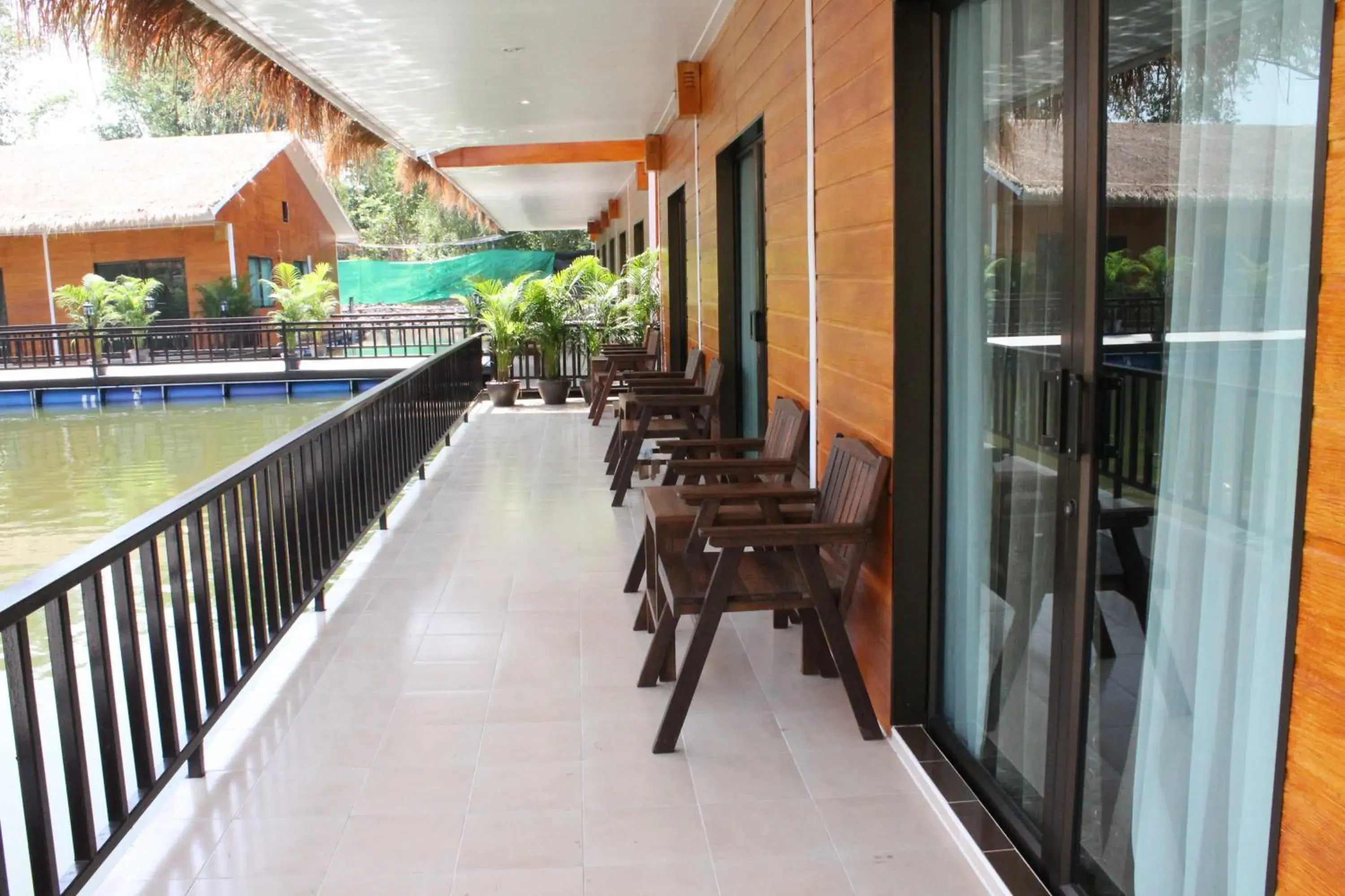 Photo of the whole room, Balcony/Terrace in Chawalun Resort