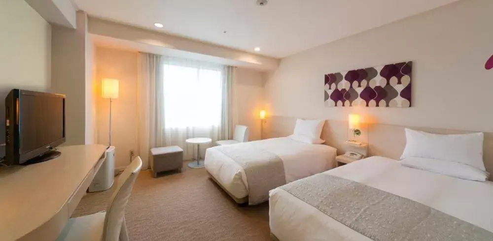 Bed in Hotel Granvia Osaka-JR Hotel Group