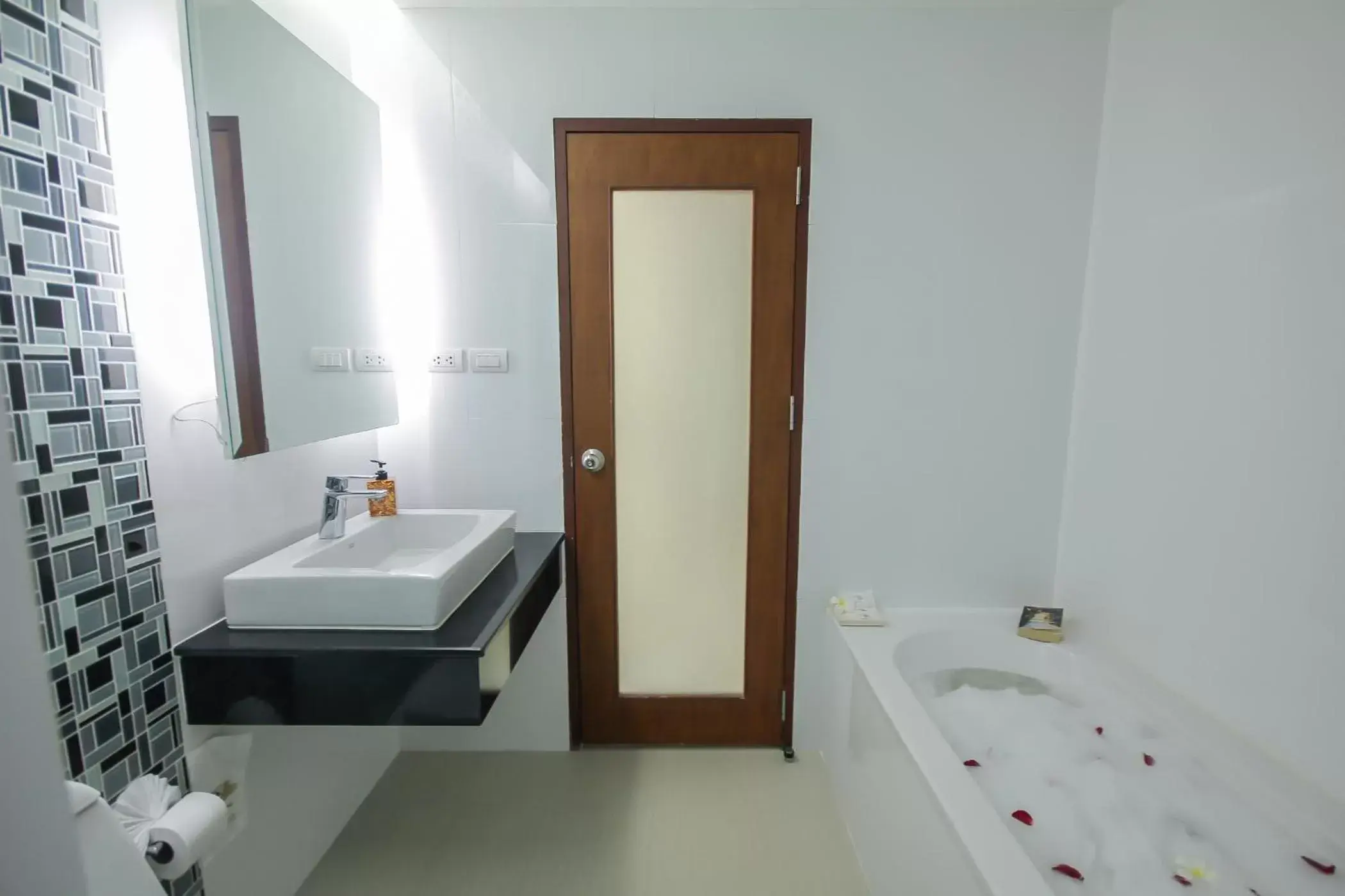 Bathroom in Baan Nilrath Hotel - SHA Extra Plus