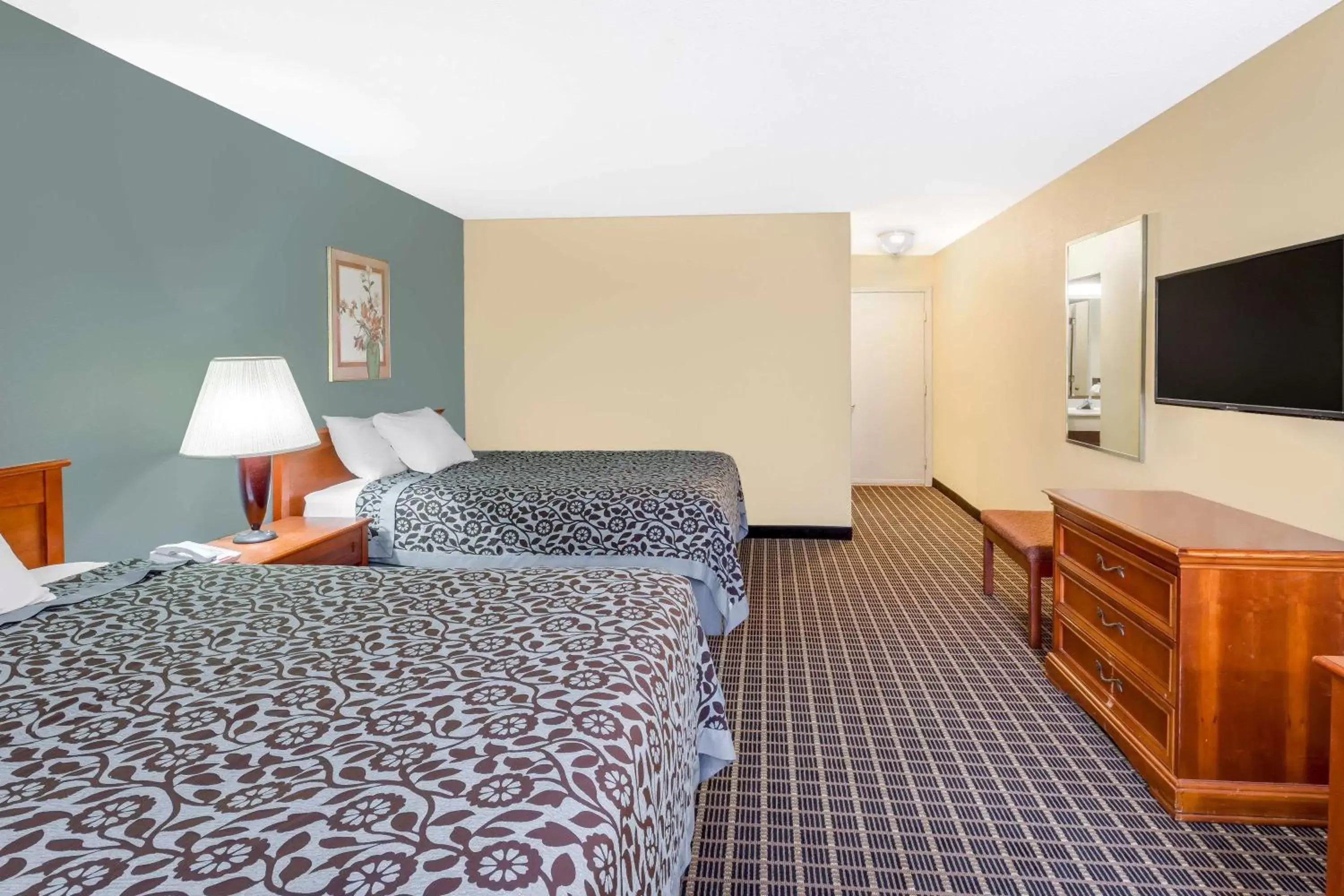 Photo of the whole room, Bed in Days Inn & Suites by Wyndham Kalamazoo