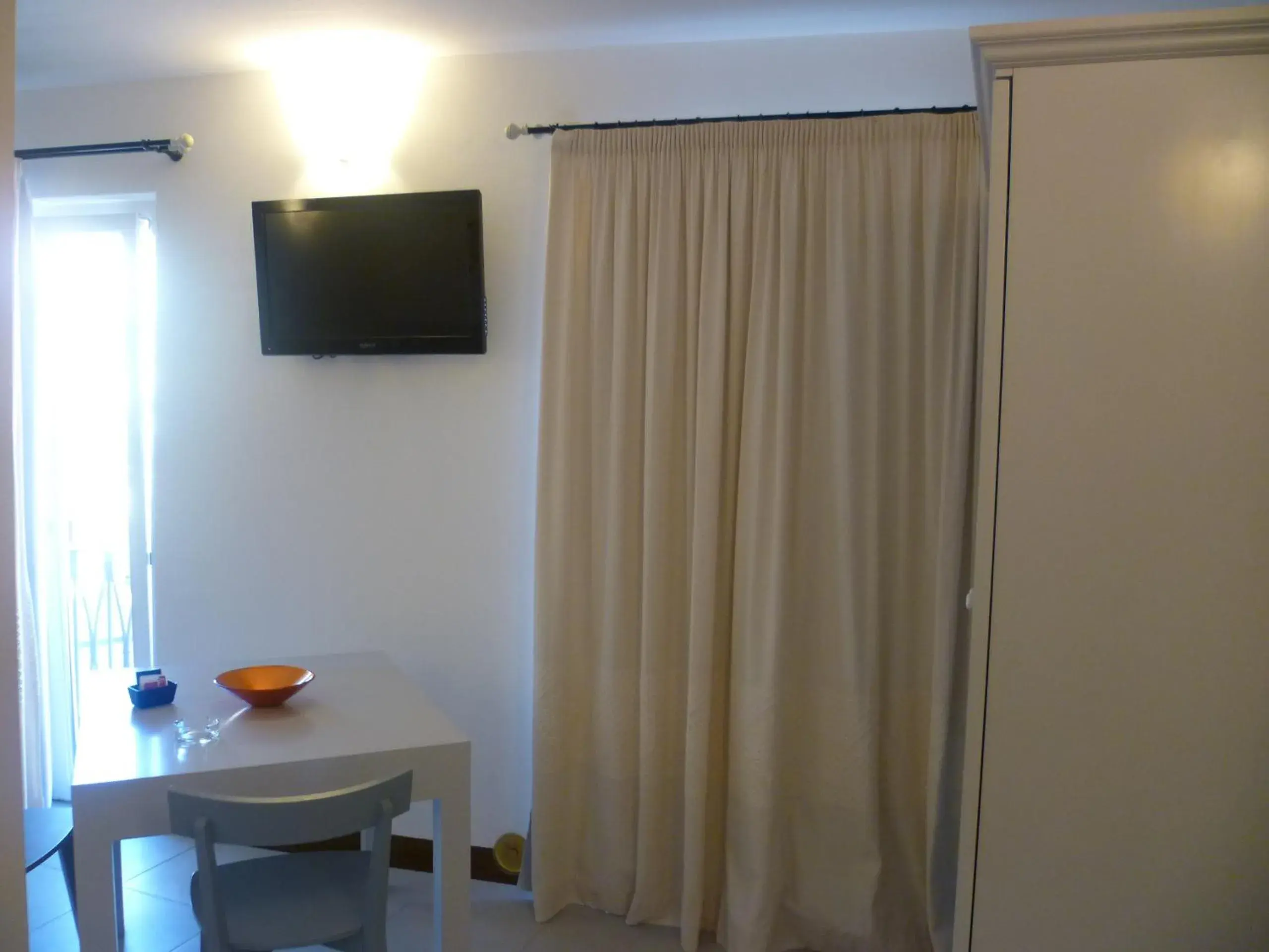 Dining area, TV/Entertainment Center in Albergo Residenziale La Corte