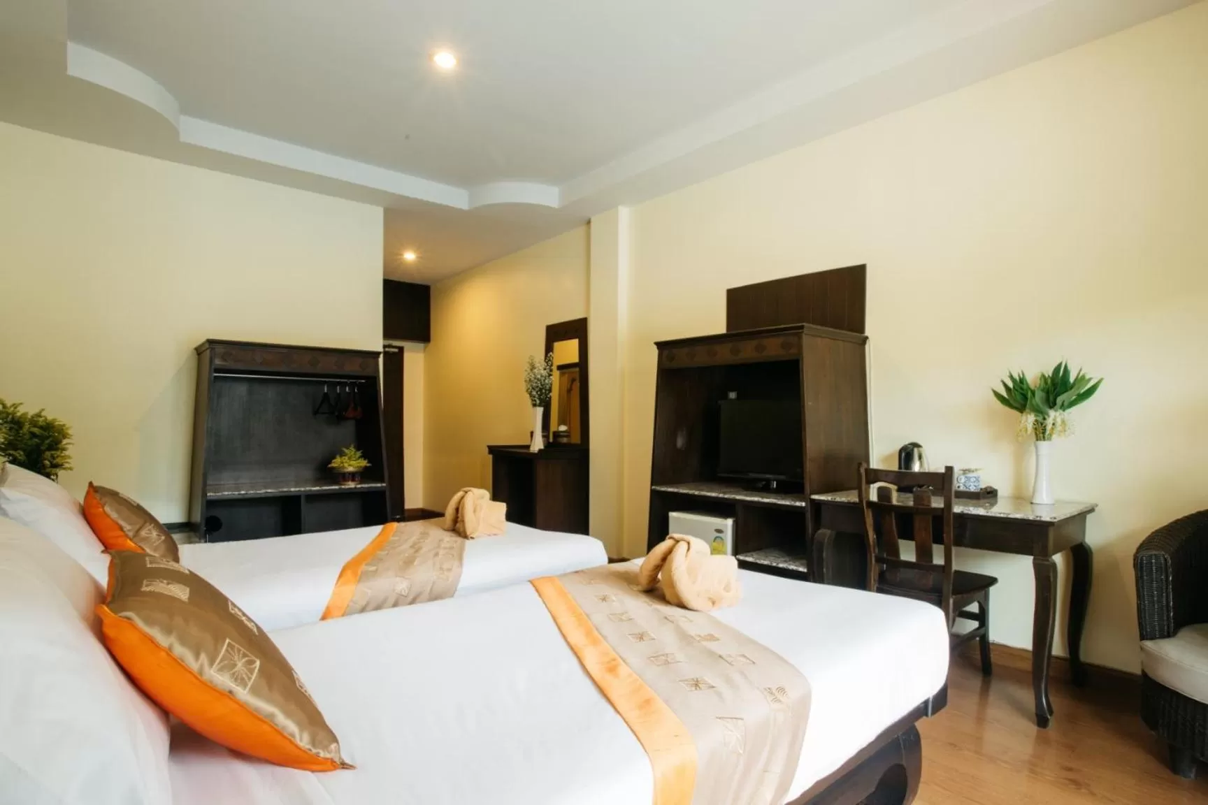 Photo of the whole room, Bed in Diamond Park Inn Chiangrai & Resort