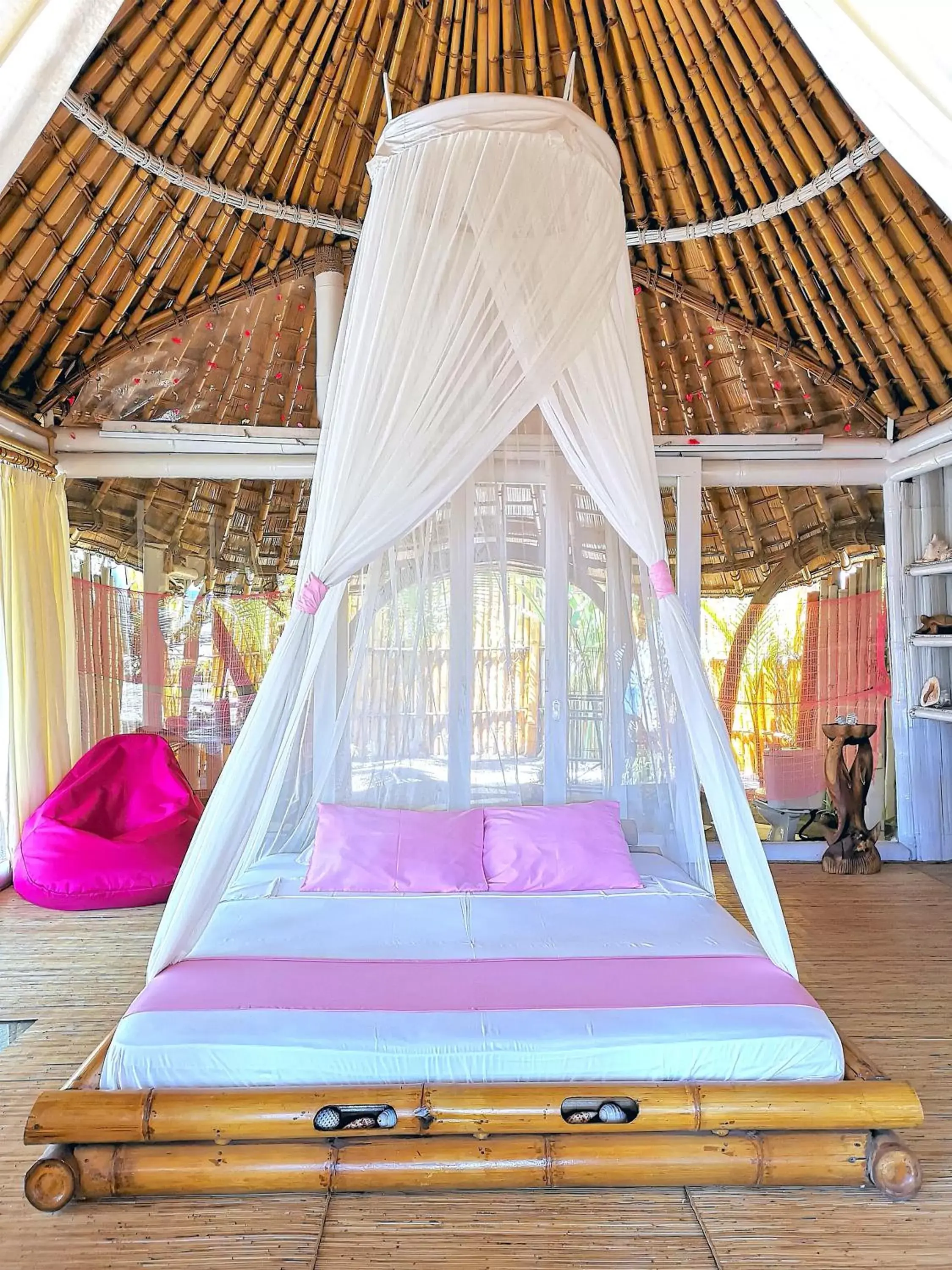 Bed in Coconut Garden Beach Resort