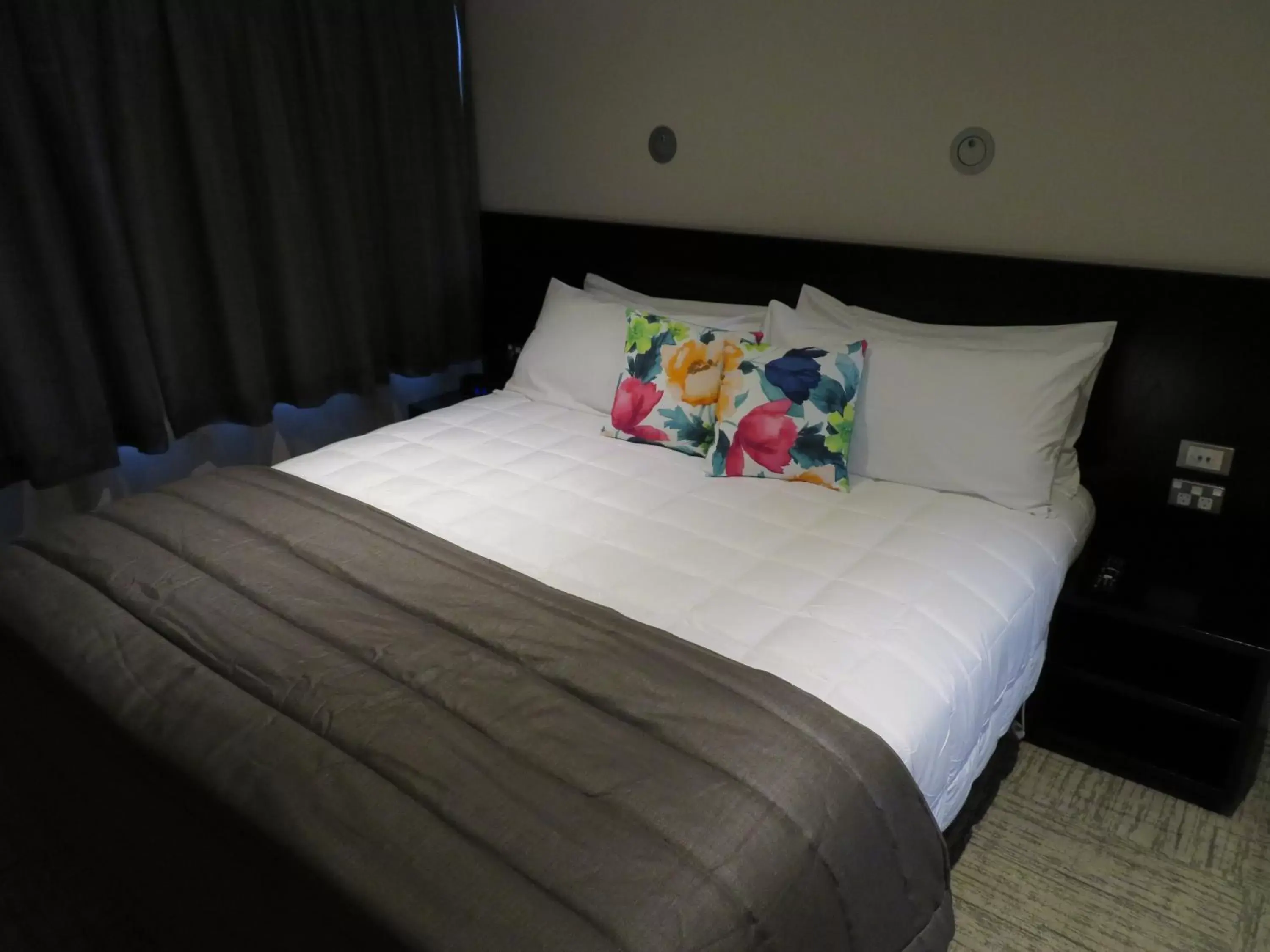 Bed in Paroa Hotel