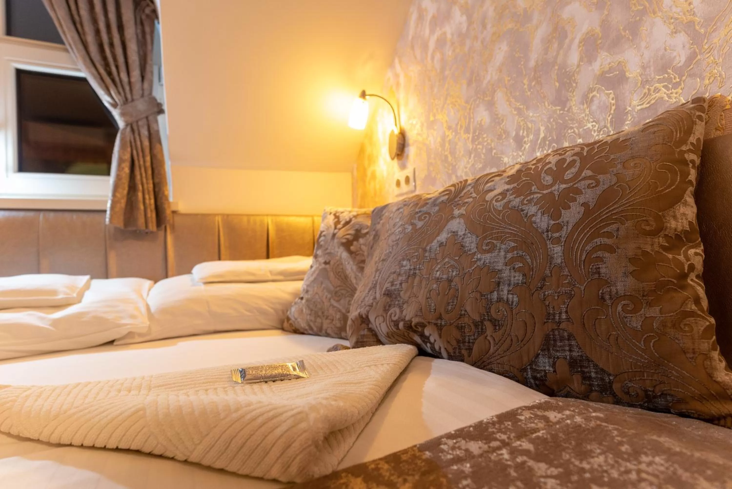 Bed in Teátrum Boutique Hotel