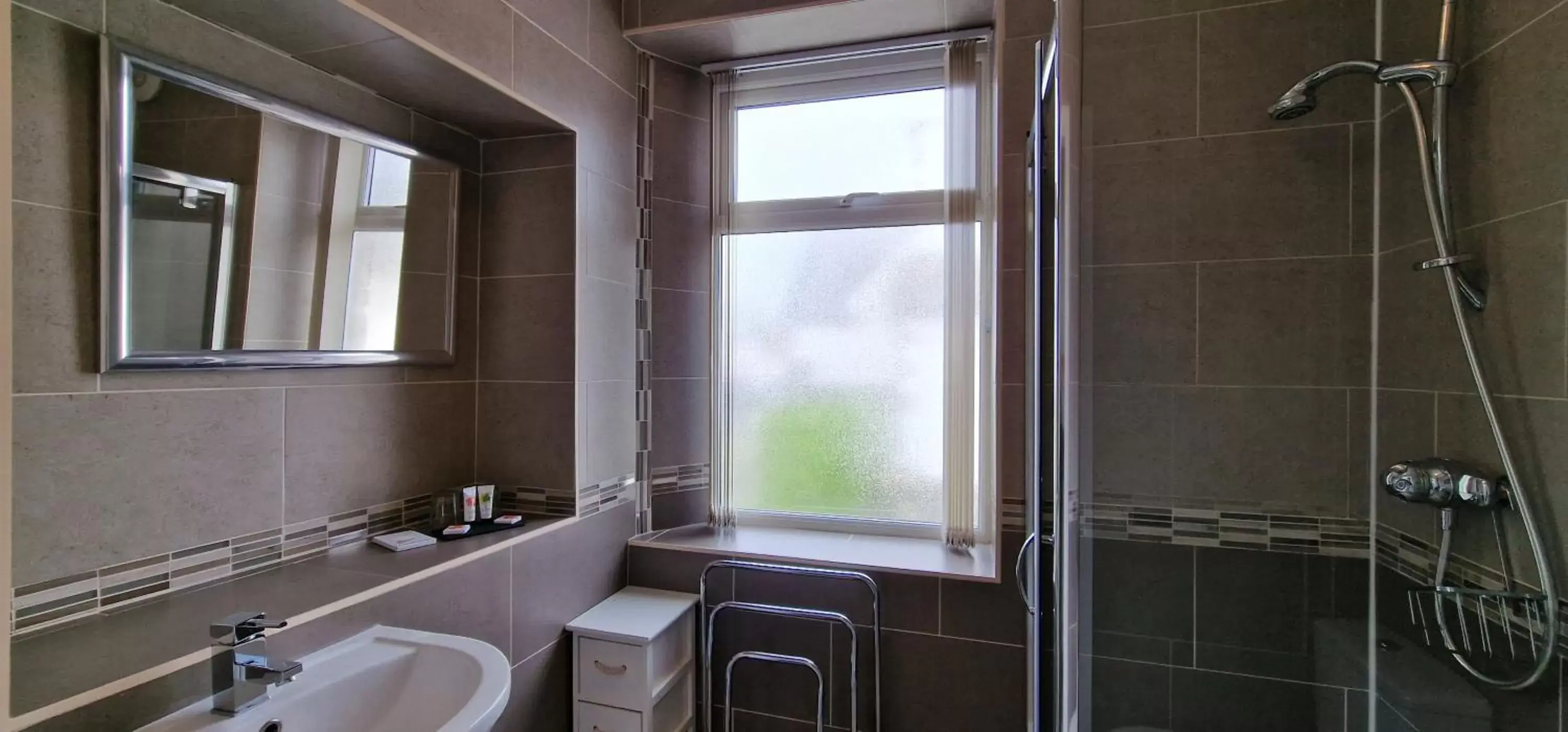 Shower, Bathroom in Bonny Brae House by Woodland Park