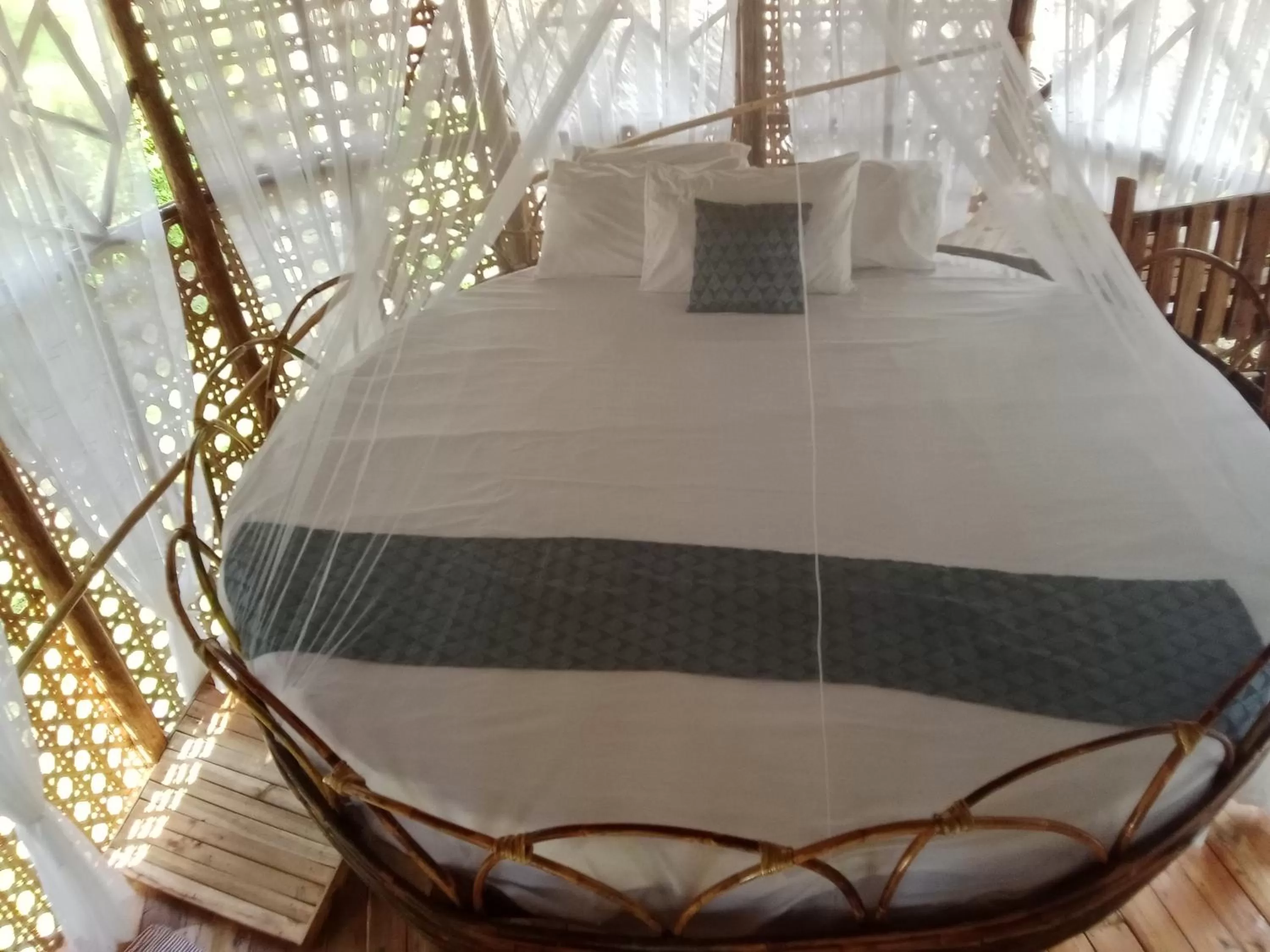 Bed in Prince John Beachfront Eco Bungalows and Restaurant