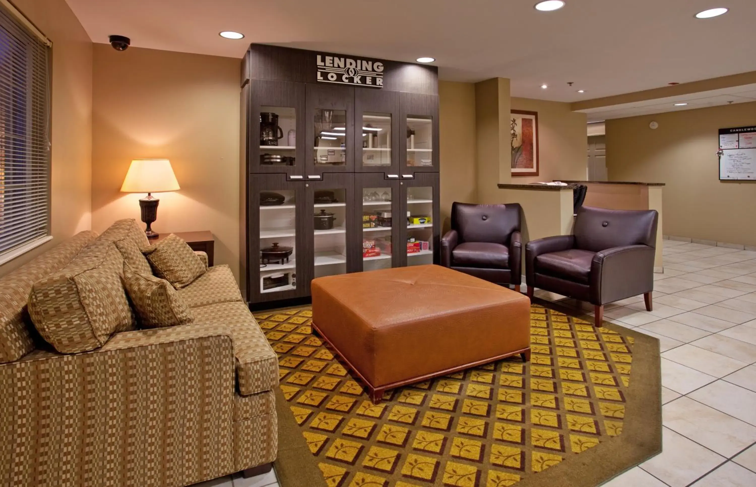 Property building, Seating Area in Candlewood Suites Rockford, an IHG Hotel