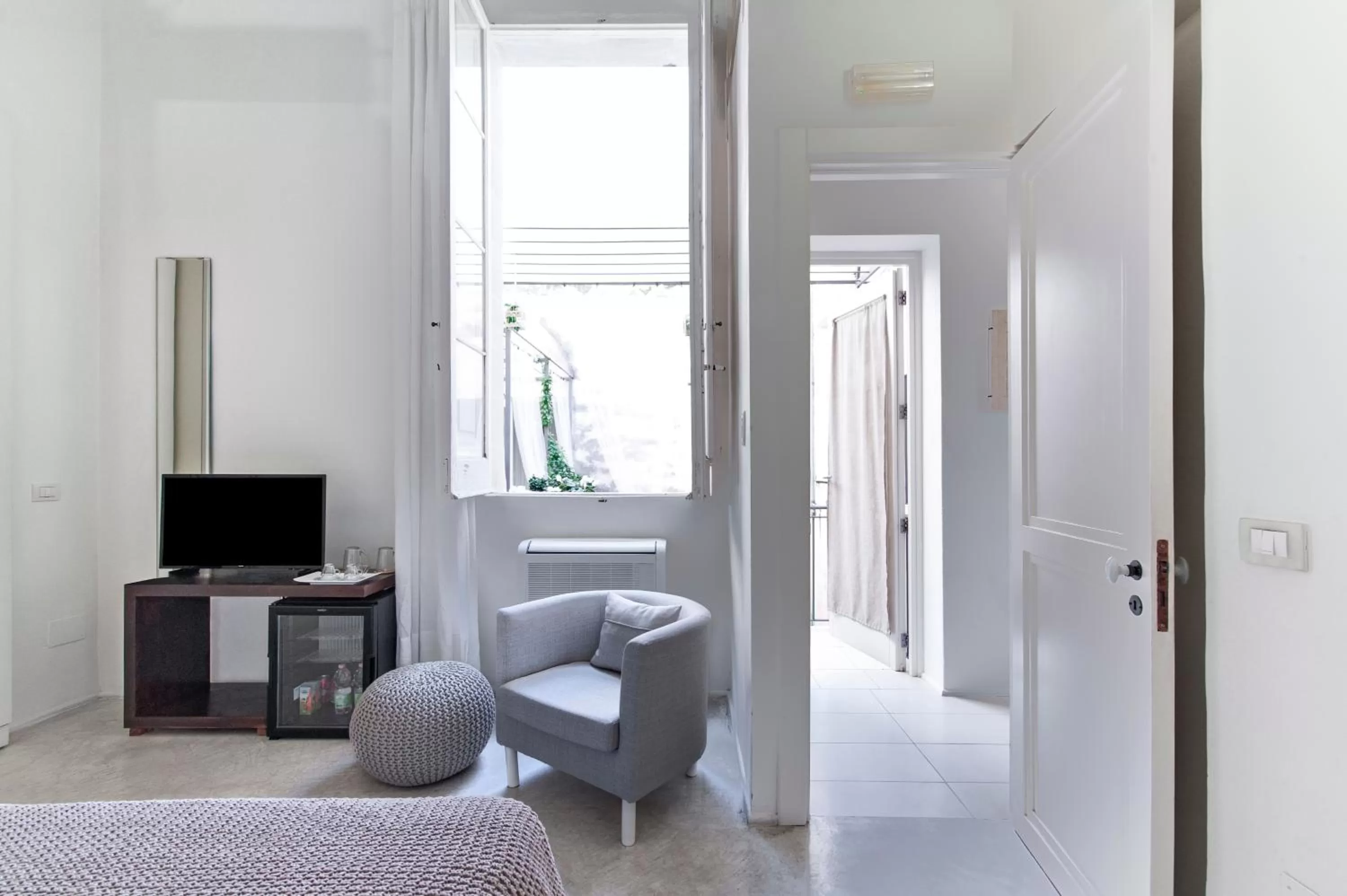 Bed in Casa di Lo Suites