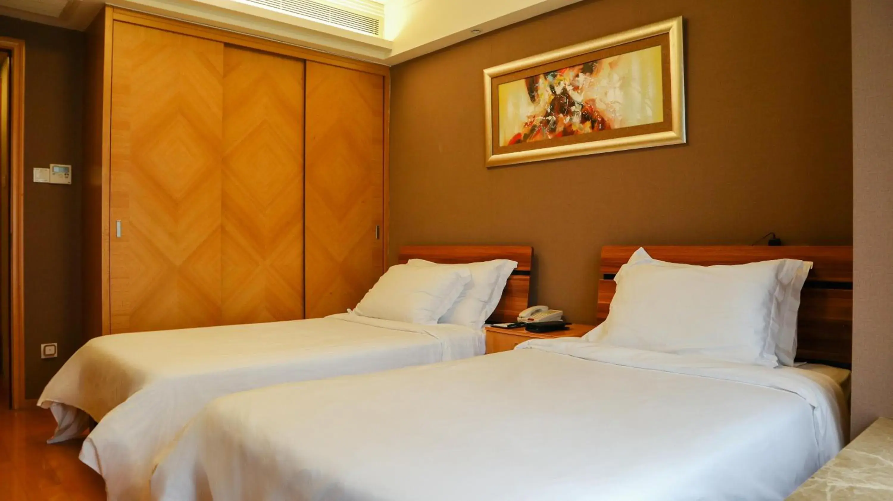 Bed in Dan Executive Hotel Apartment Zhujiang New Town