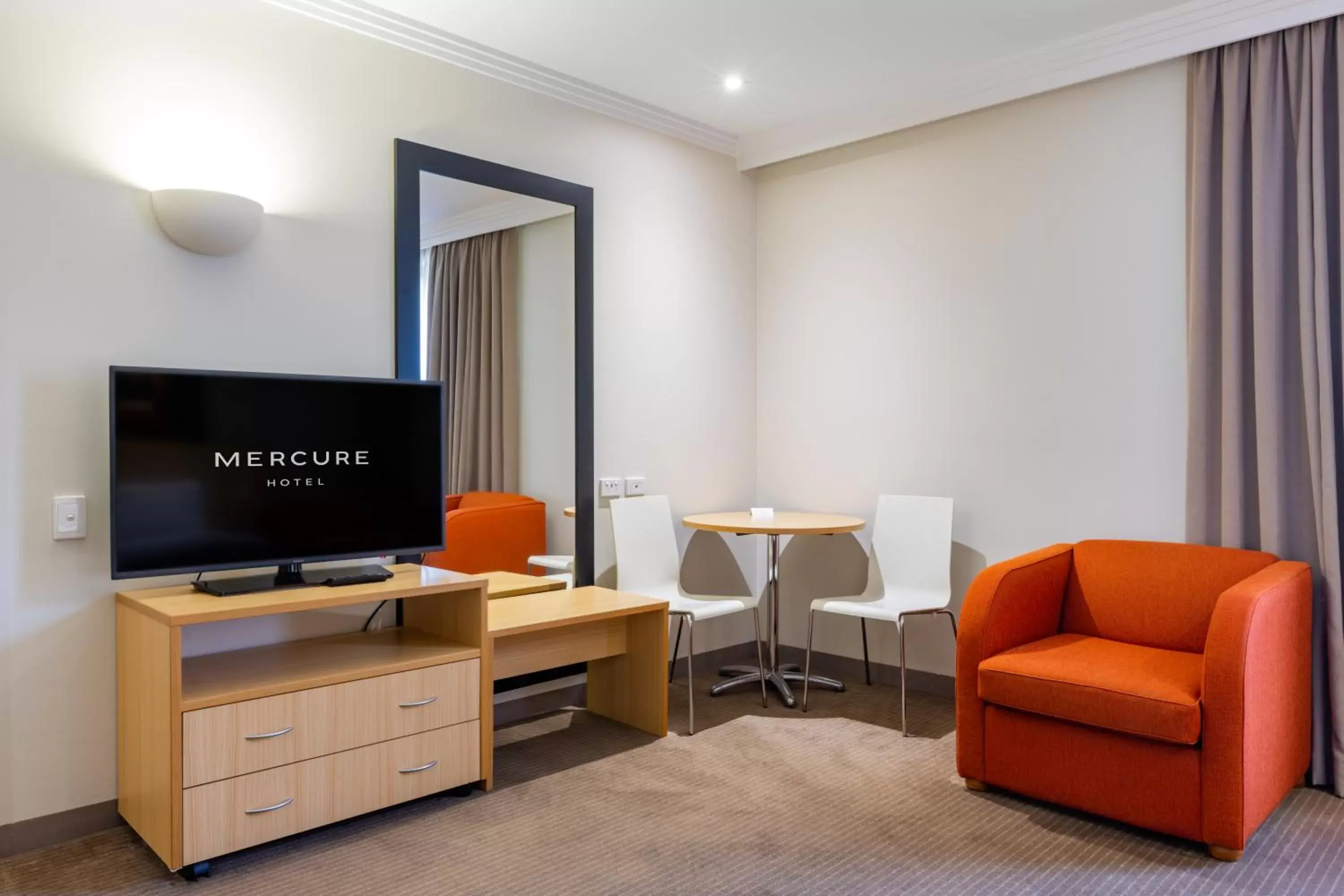 TV and multimedia, TV/Entertainment Center in Mercure Brisbane Garden City