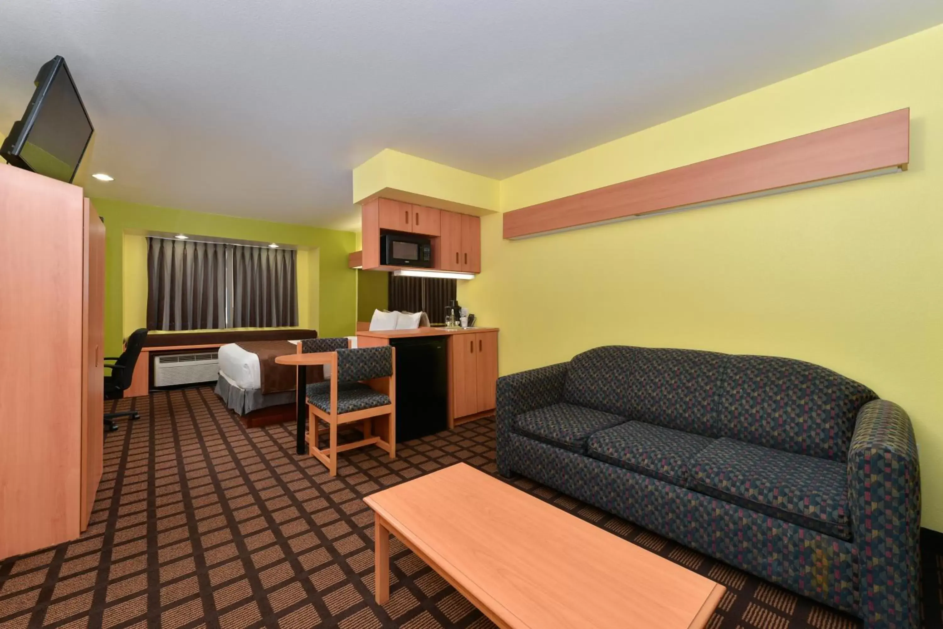 Photo of the whole room, Seating Area in Microtel Inn & Suites by Wyndham Ft. Worth North/At Fossil