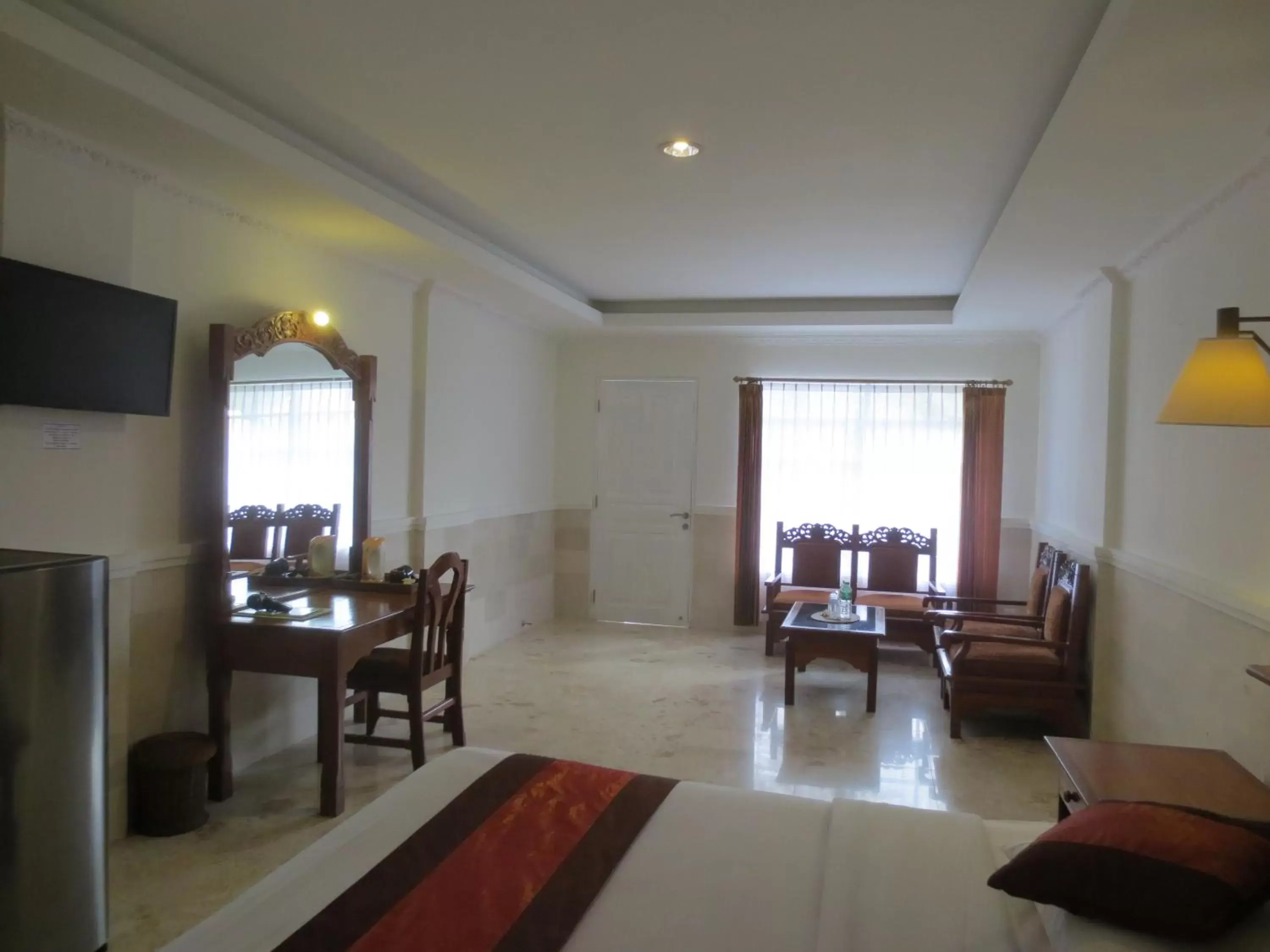 Bedroom, Restaurant/Places to Eat in Melasti Beach Resort & Spa Legian