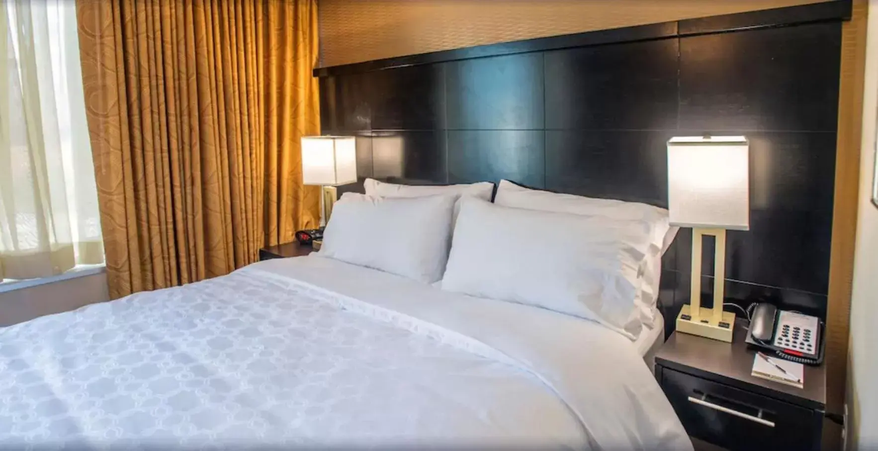 Bed in Staybridge Suites Denver Downtown, an IHG Hotel