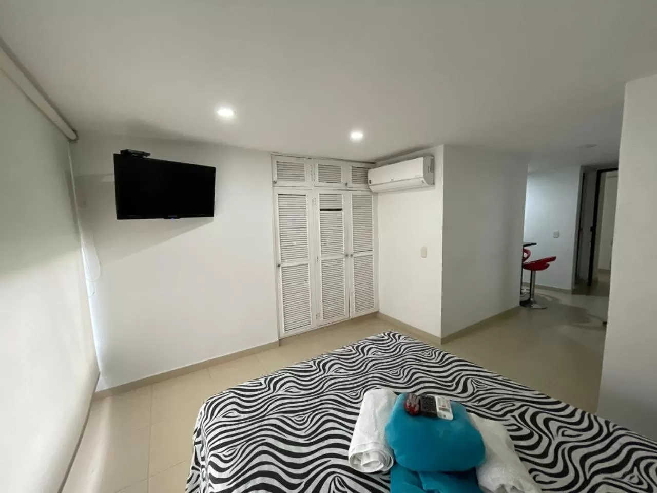 Photo of the whole room, Bed in Lindos apartaestudios y habitaciones en Ibague
