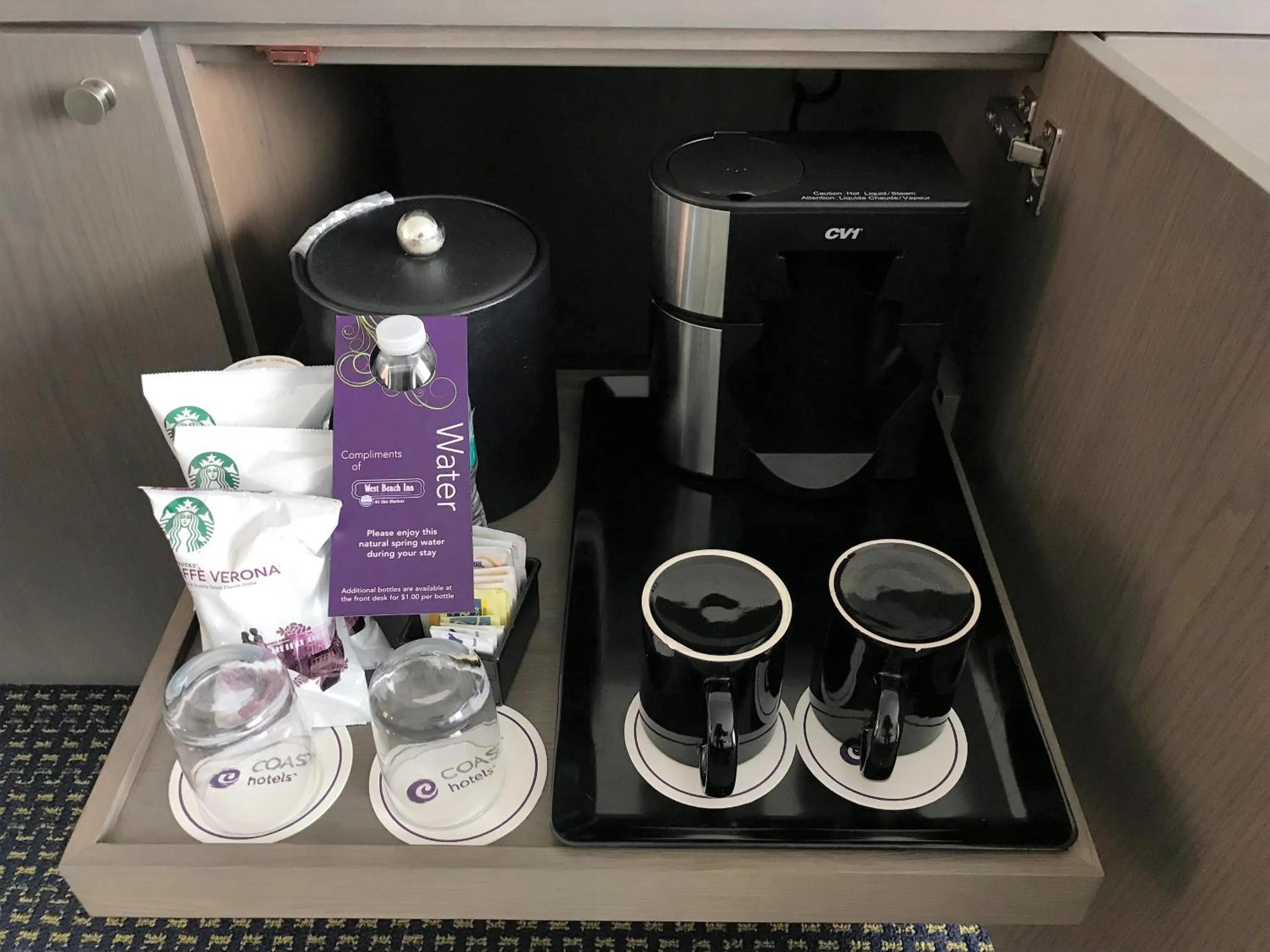 Coffee/tea facilities in West Beach Inn, a Coast Hotel