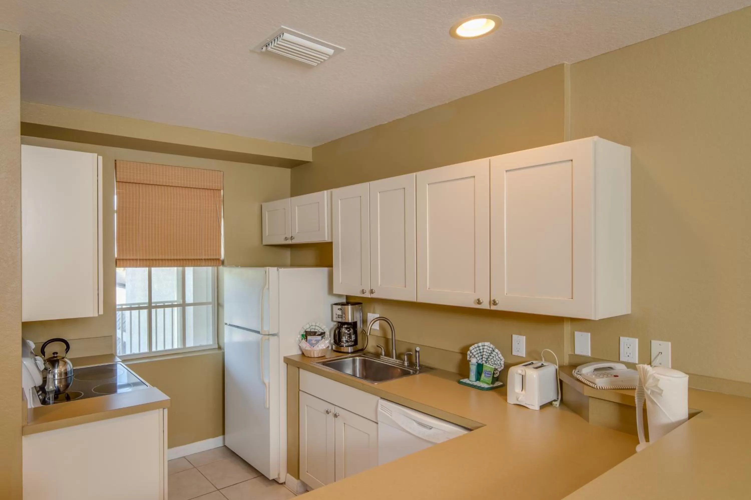 Kitchen or kitchenette in Olde Marco Island Inn and Suites