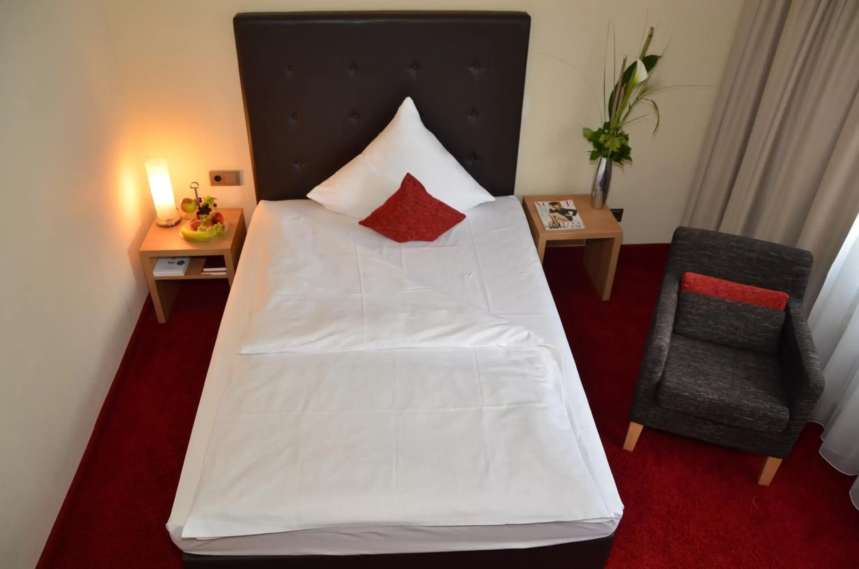 Bed in Concorde Hotel Viktoria