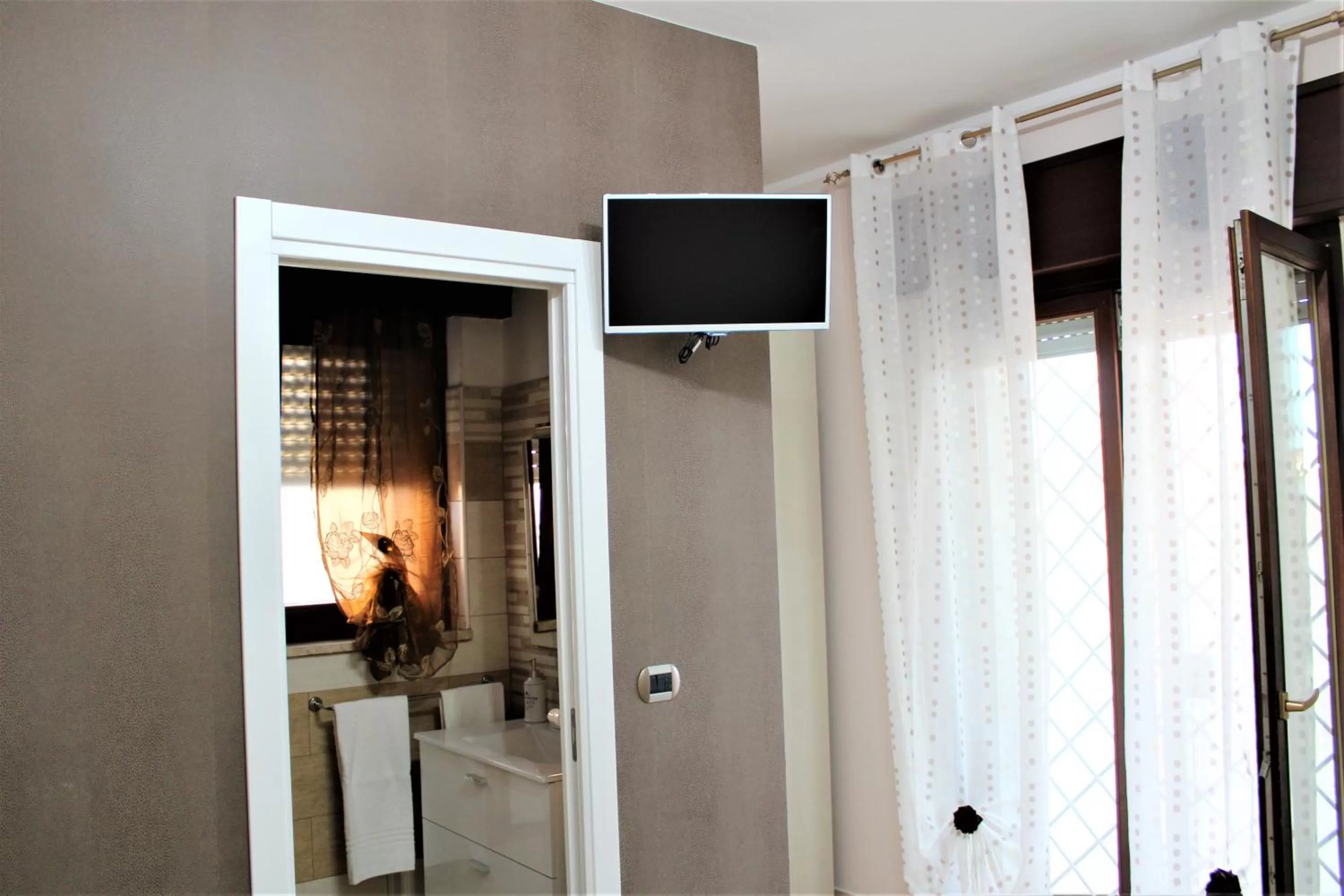 Bathroom, TV/Entertainment Center in Emotions