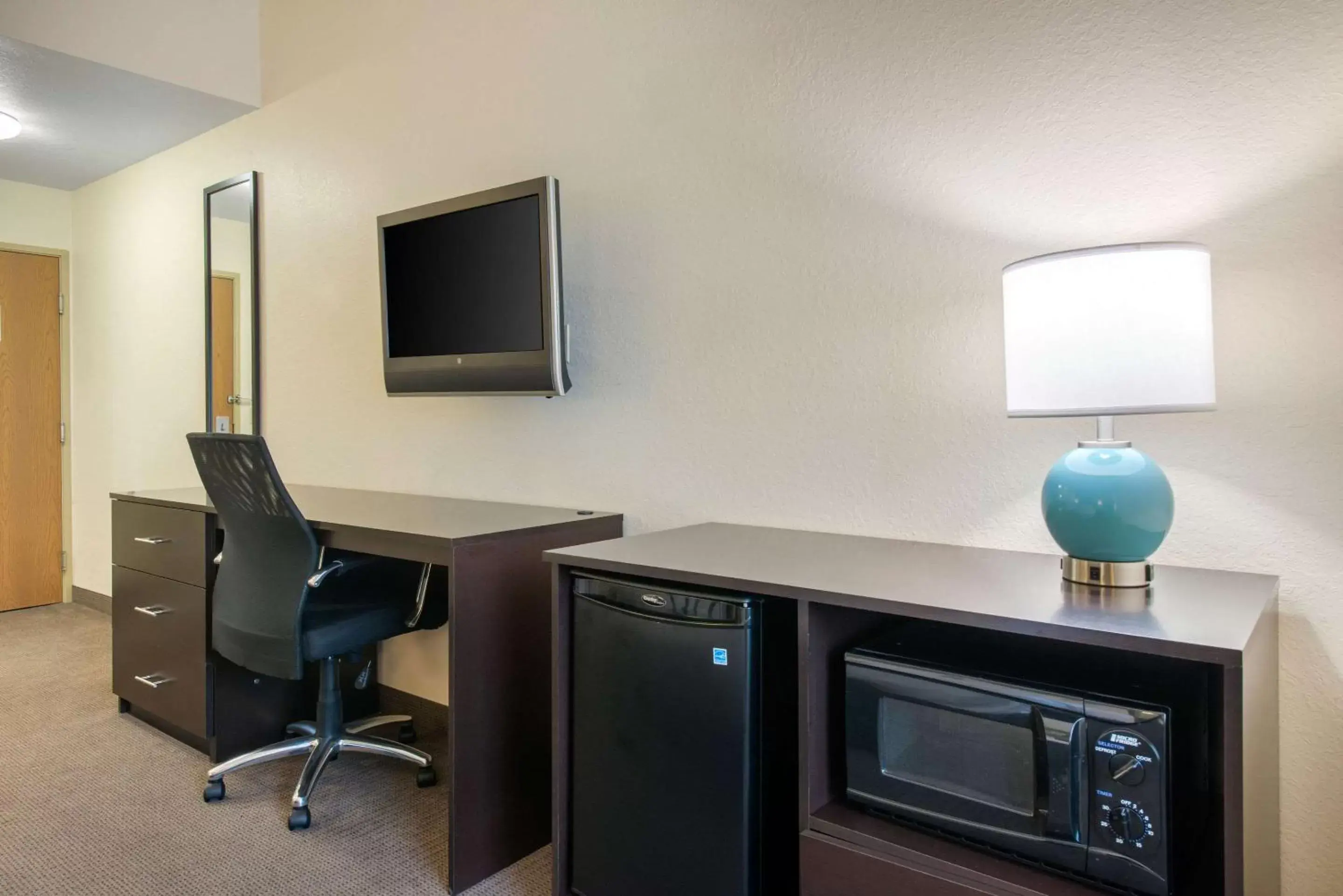 Photo of the whole room, TV/Entertainment Center in Sleep Inn & Suites Port Charlotte-Punta Gorda