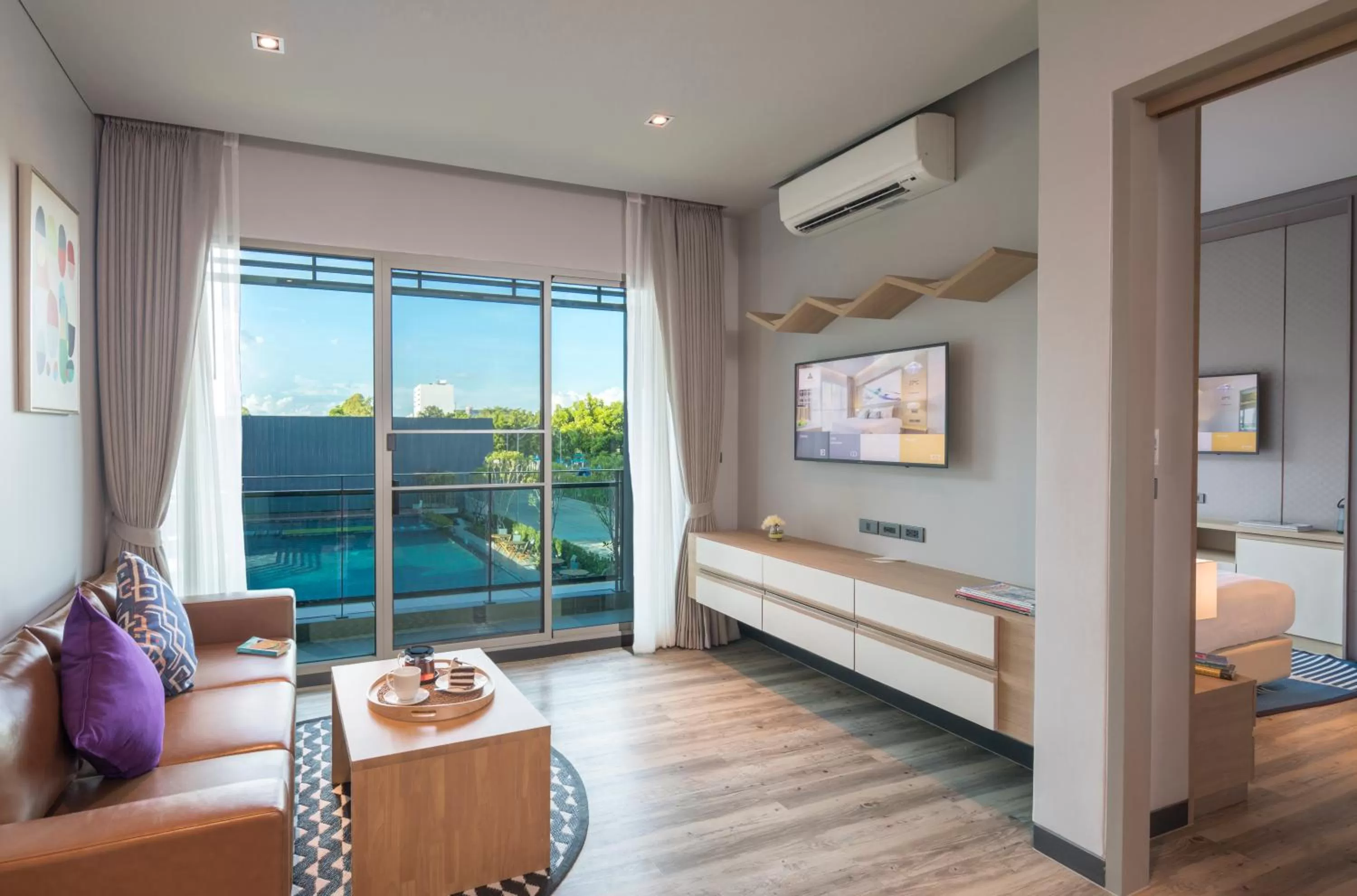 Living room, Bed in AisanA Hotel Korat