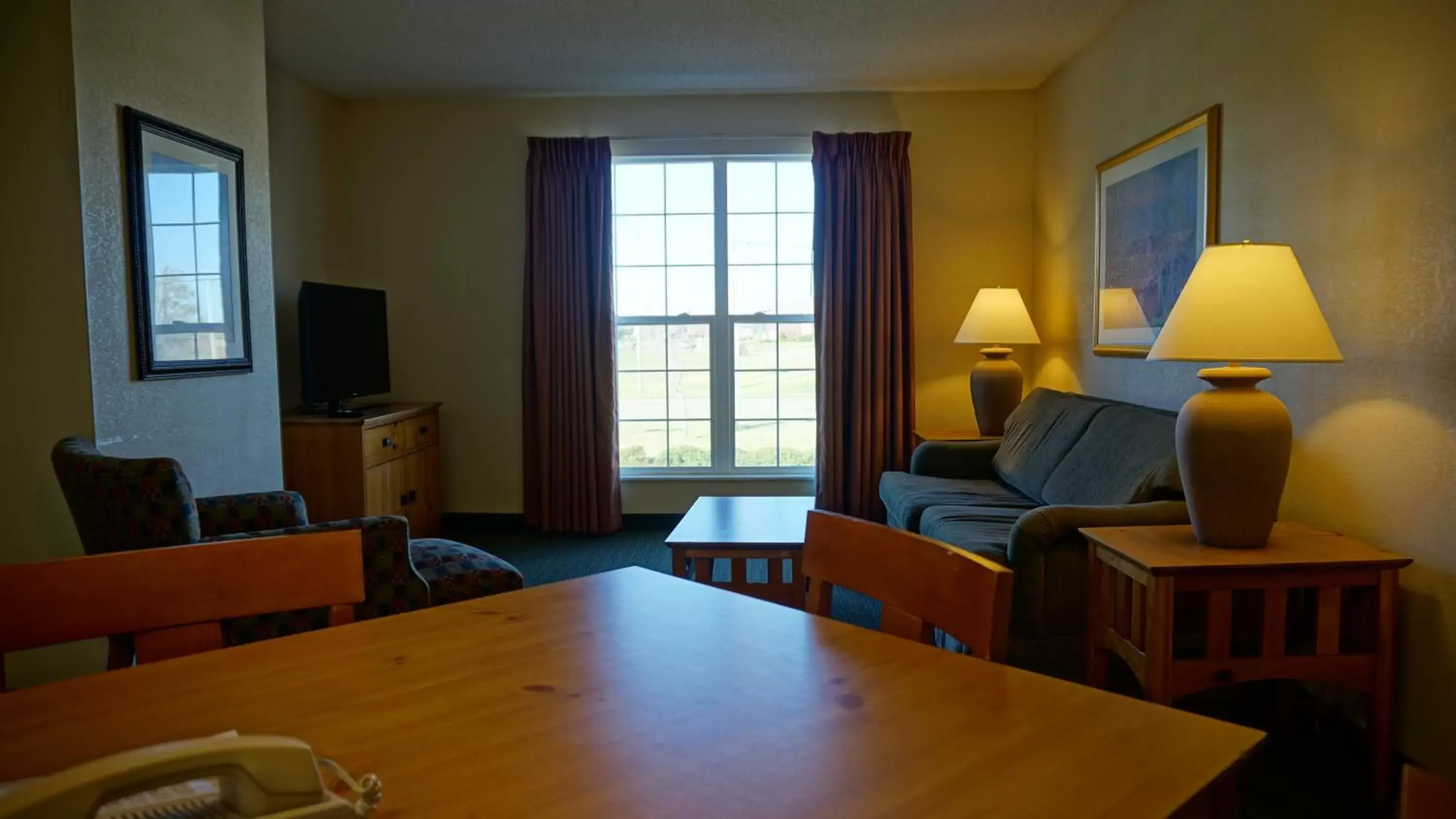 Living room in Baymont by Wyndham Wichita East Living room in Baymont by Wyndham Wichita East