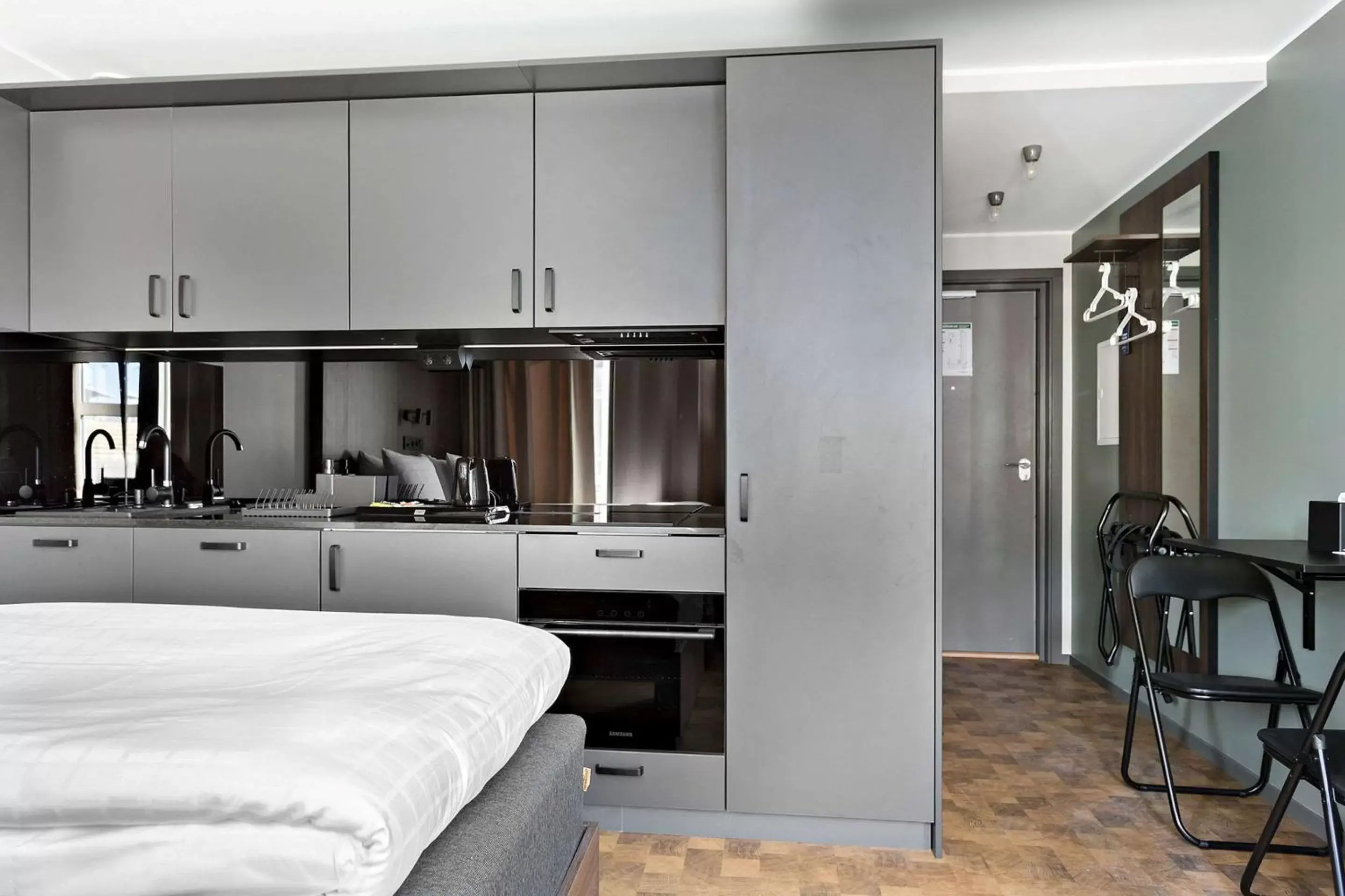 Bed, Kitchen/Kitchenette in Sure Hotel Studio by Best Western Bromma