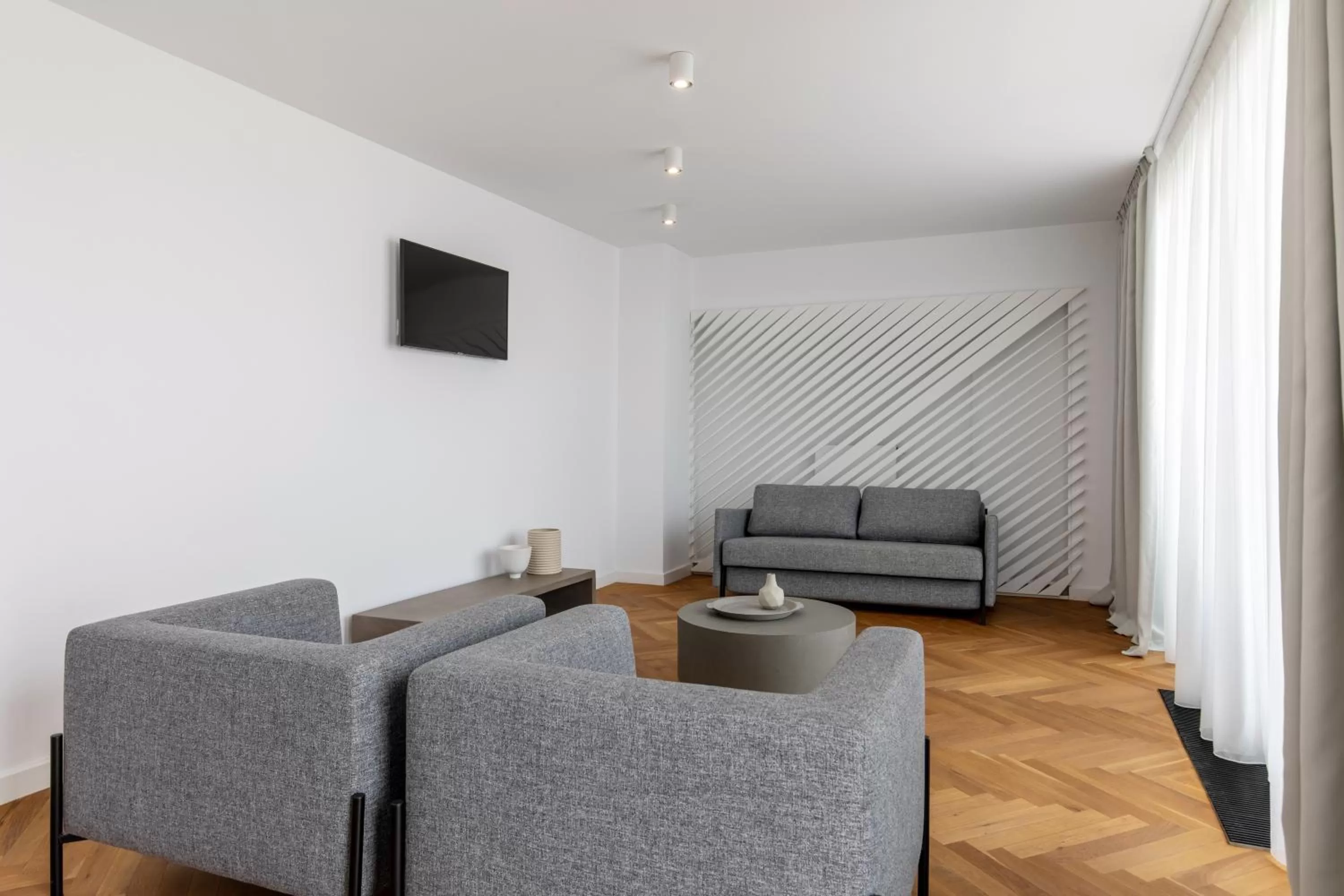 Communal lounge/ TV room in Aparthotel Blend City Center