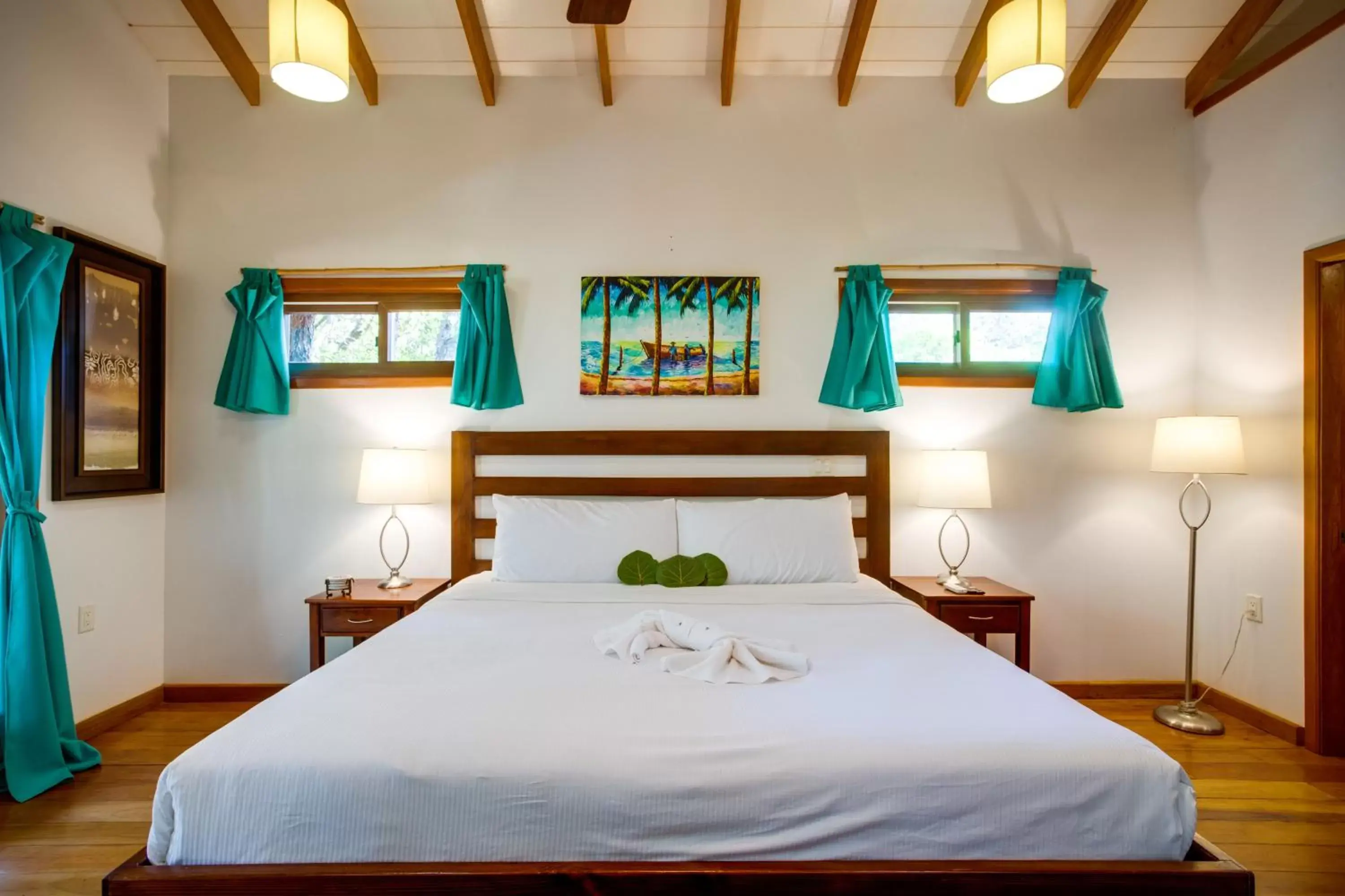 Bed in Mariposa Belize Beach Resort