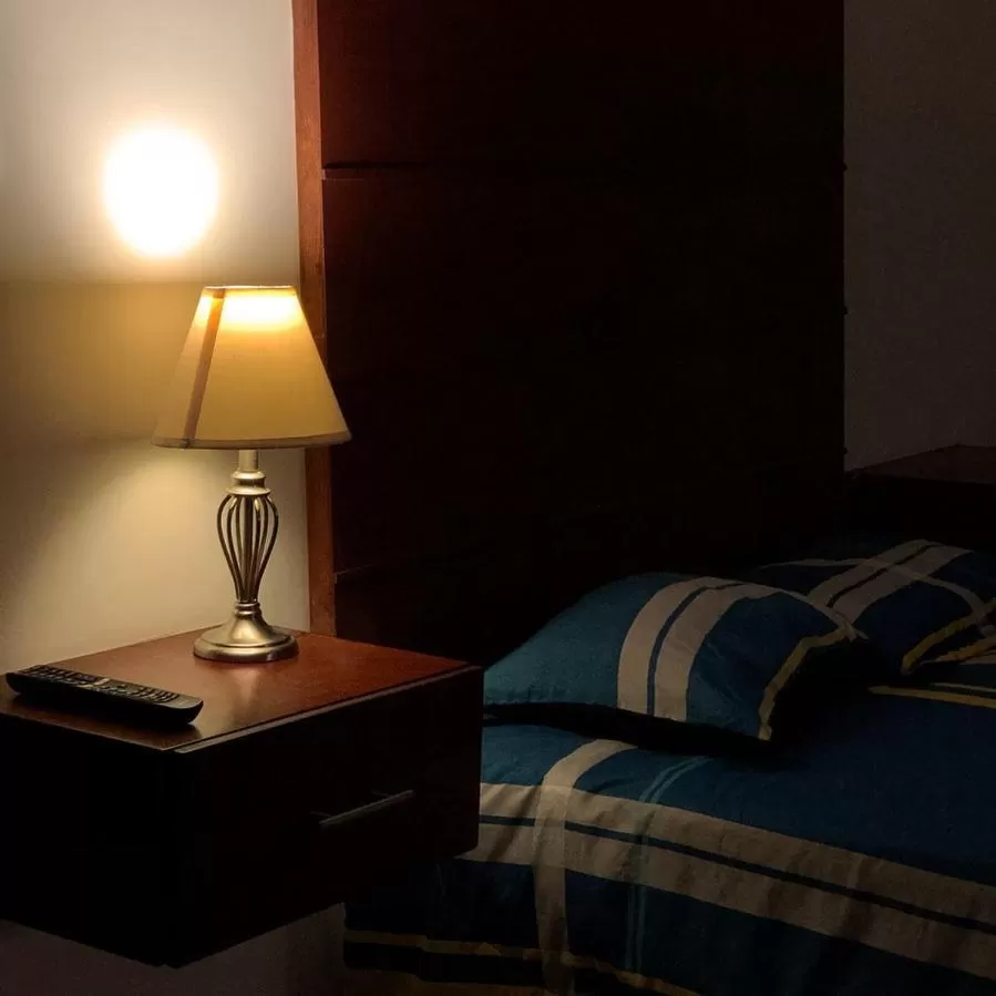 Living room, Bed in Departamentos Bonsai