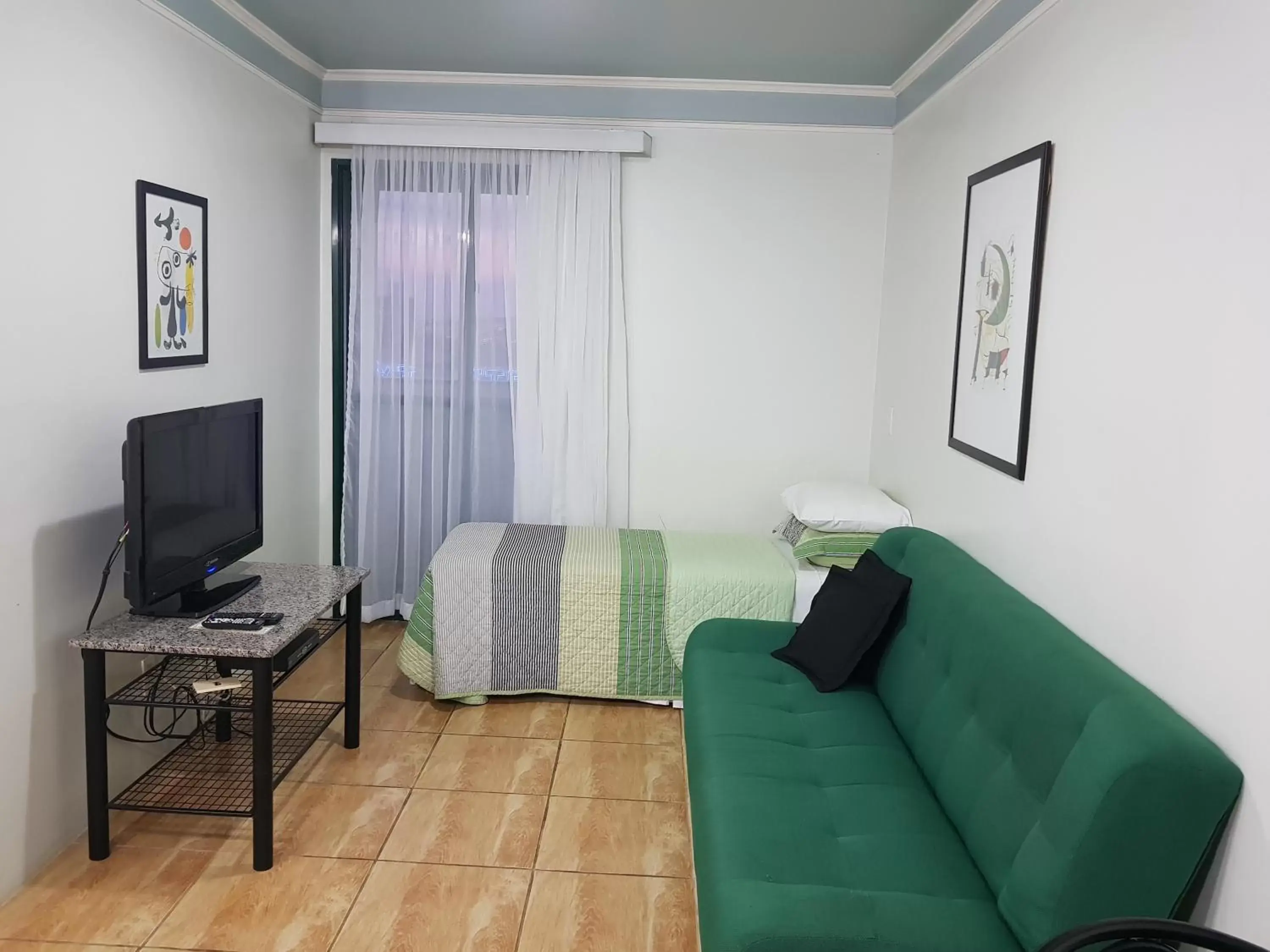 Bed, Seating Area in Flat Saint Paul Residence