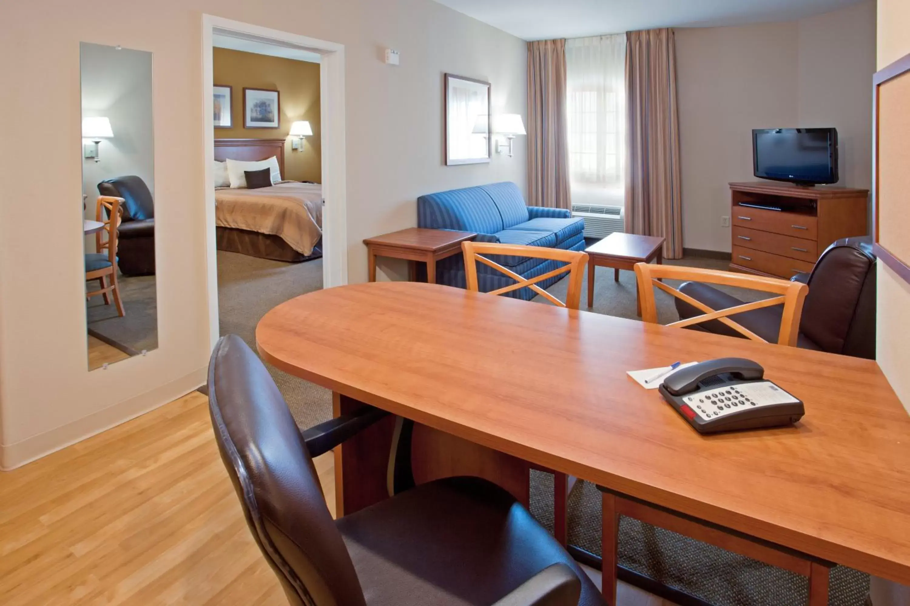 Photo of the whole room, Seating Area in Candlewood Suites League City, an IHG Hotel