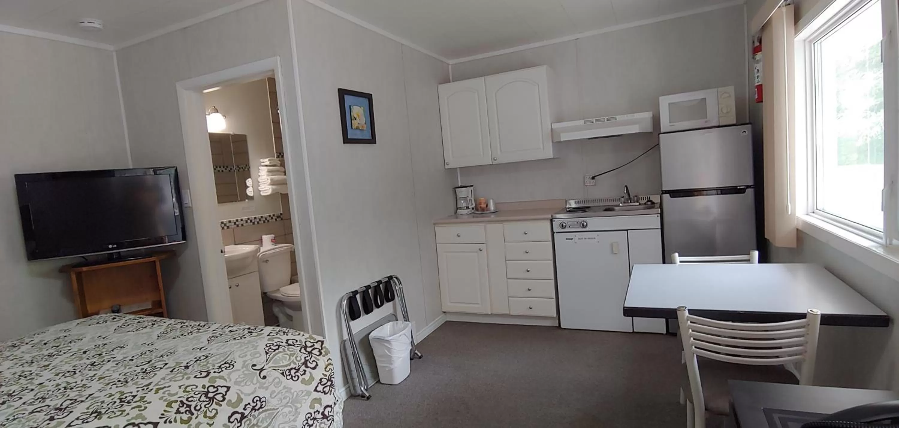 Kitchen or kitchenette in Sunset motel