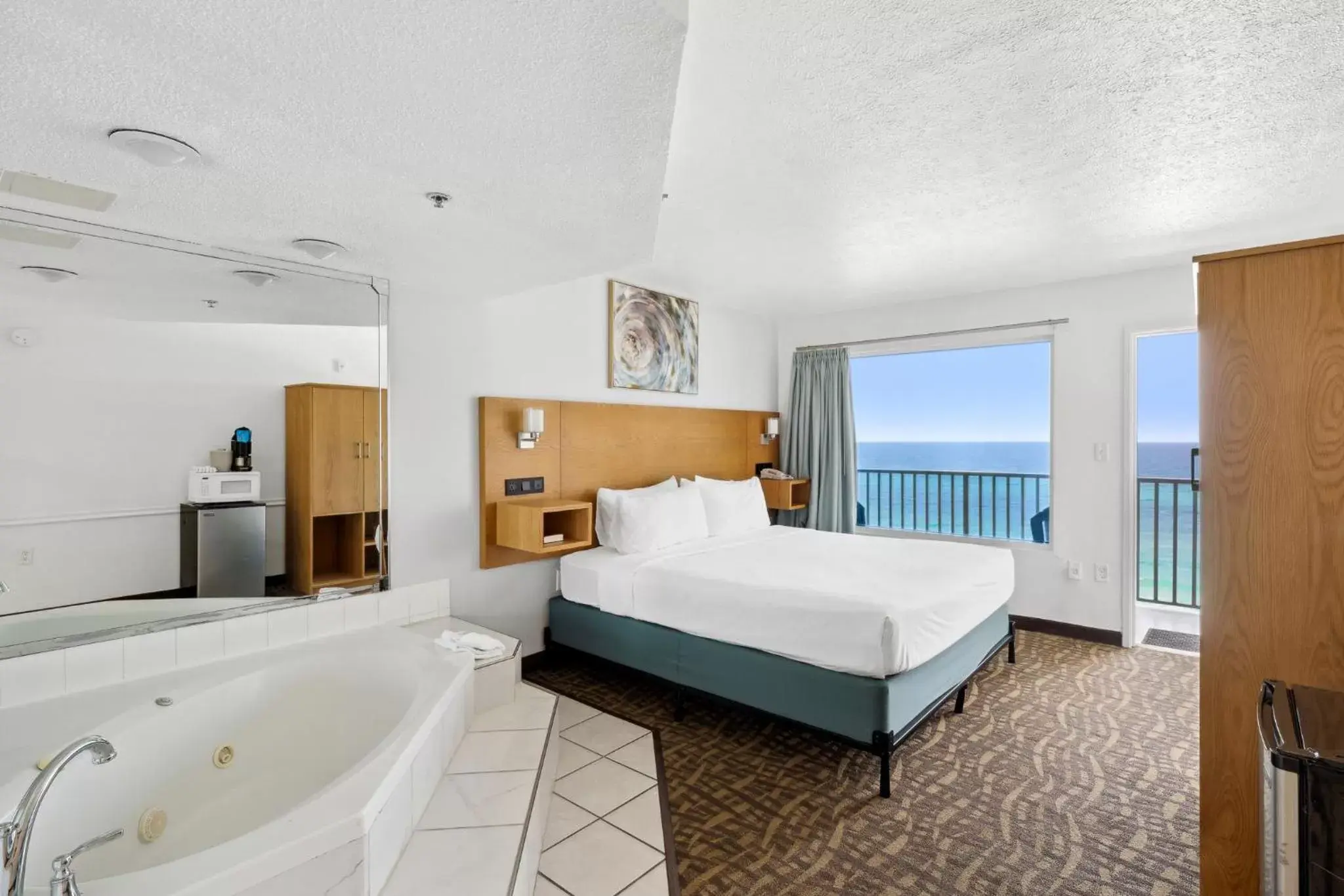 Bedroom in Beachcomber Beachfront Hotel, a By The Sea Resort