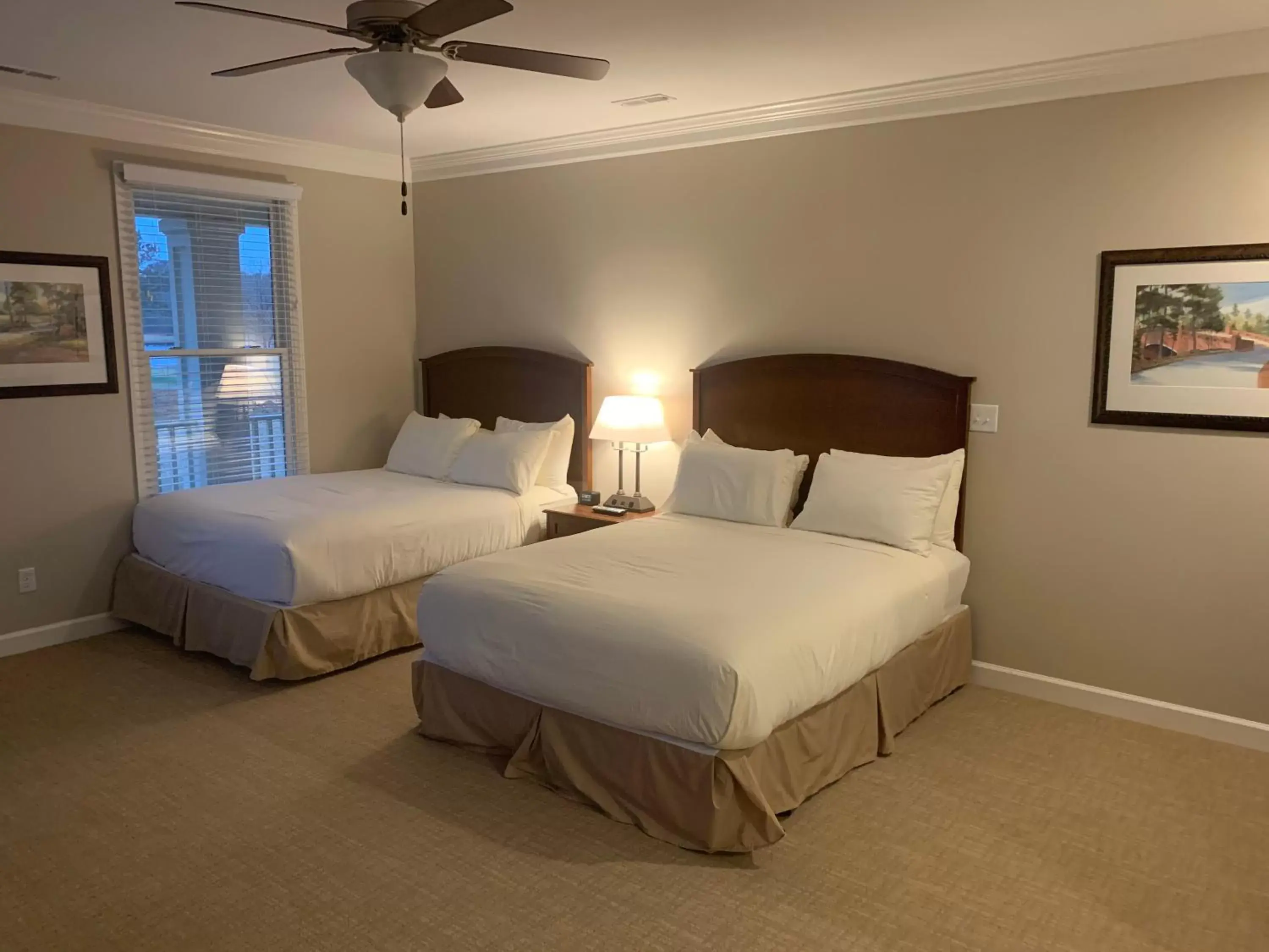 Bed in Cottages and Suites at River Landing