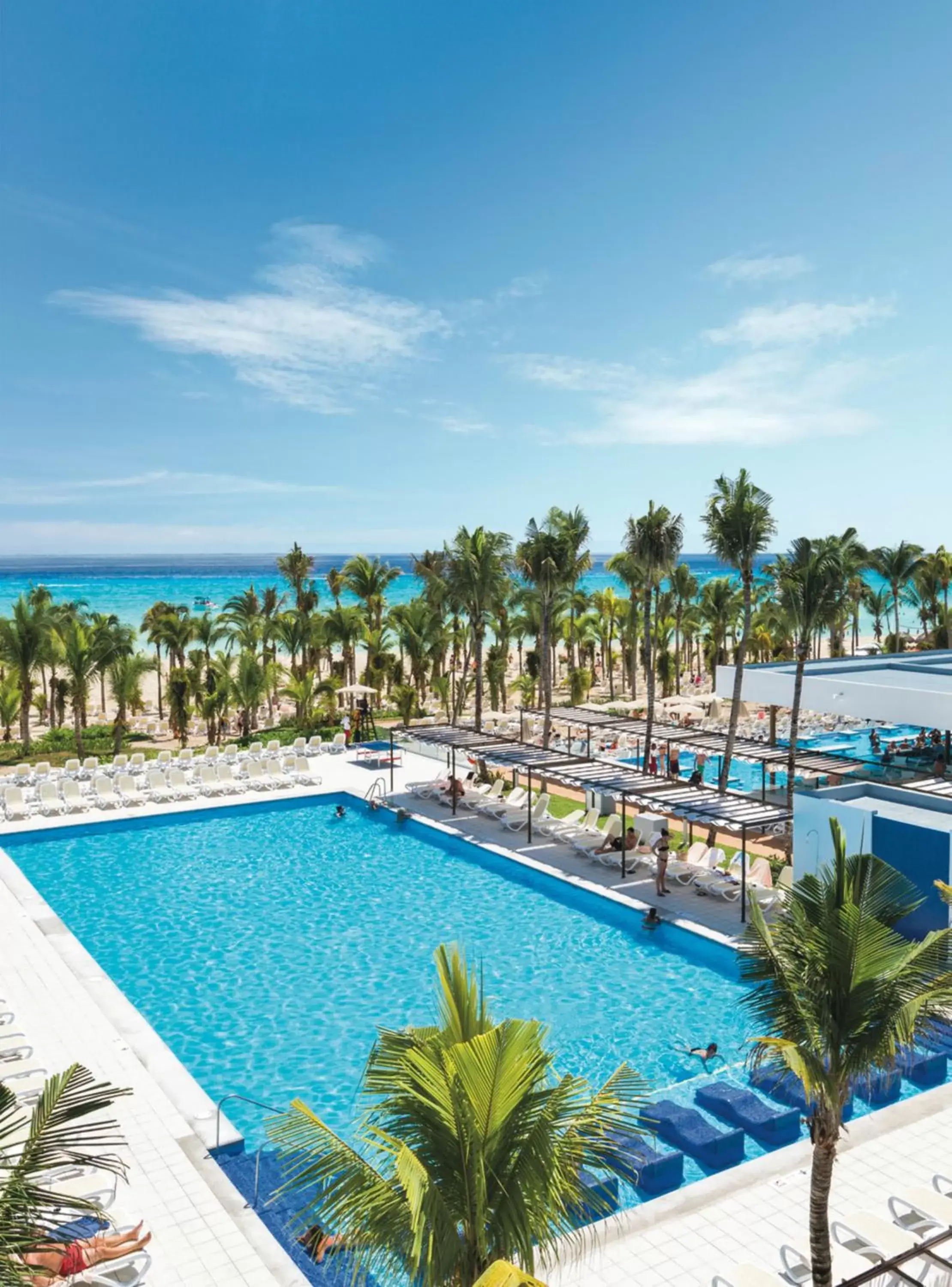 Swimming pool in Riu Playacar - All Inclusive Swimming pool in Riu Playacar - All Inclusive
