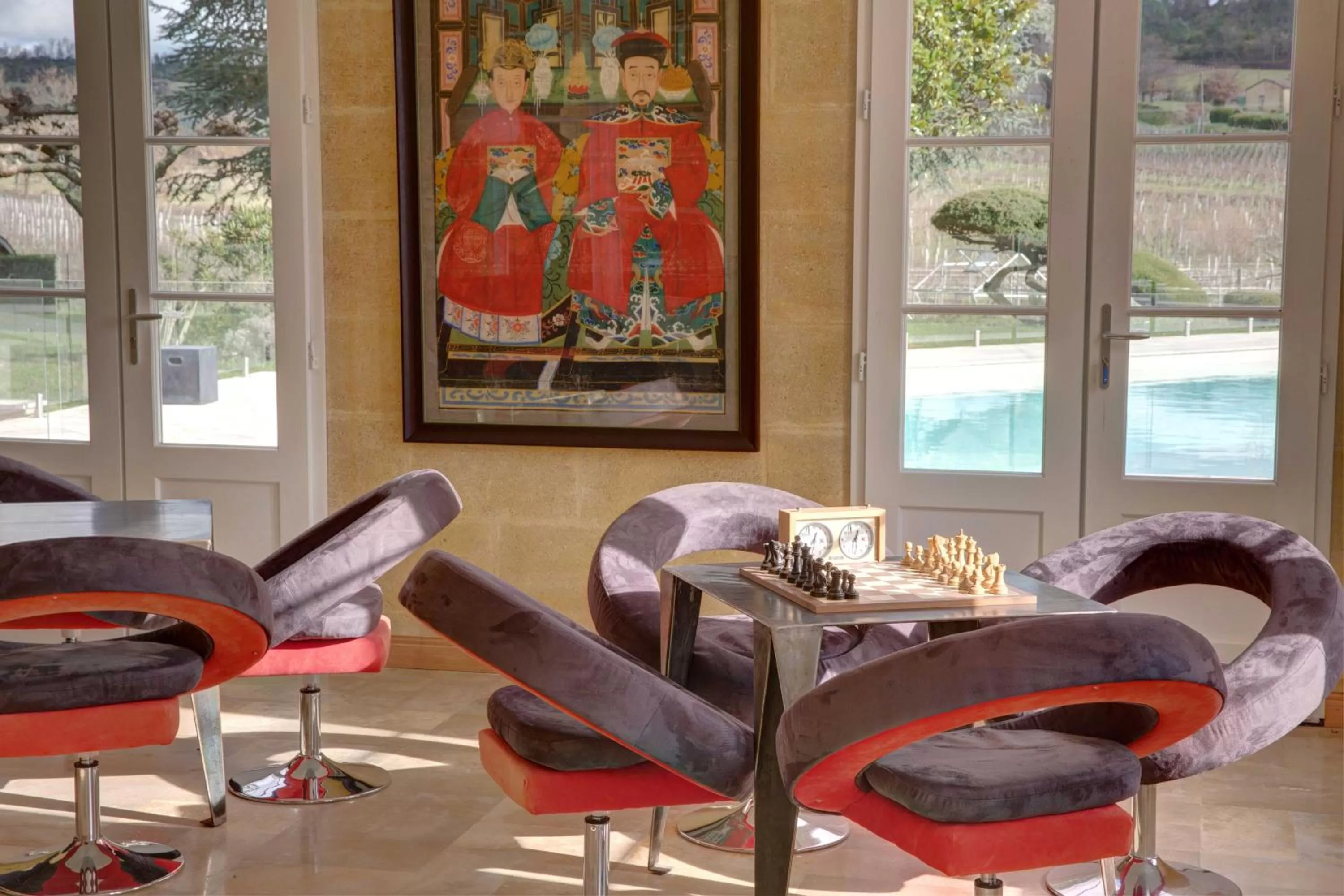 Communal lounge/ TV room in Chateau du Palanquey & SPA